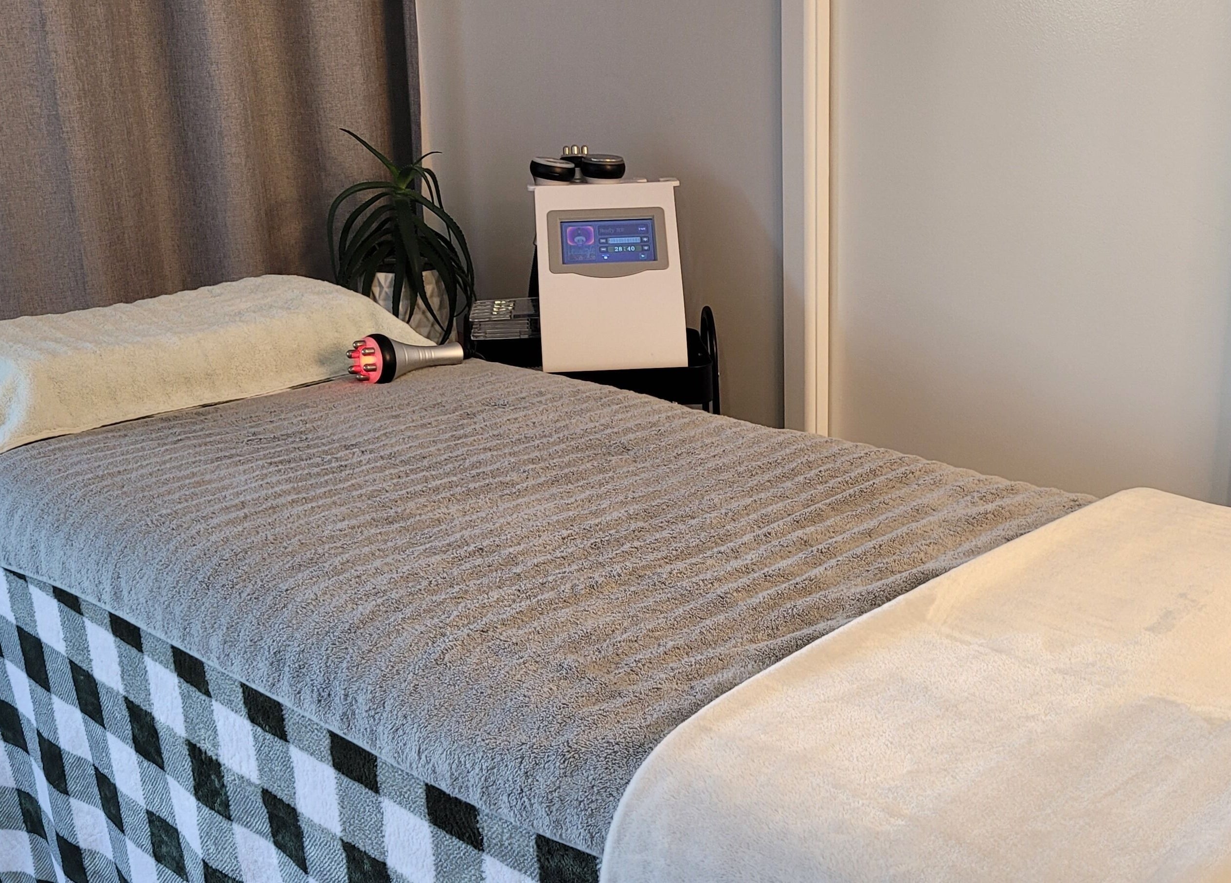 Massage bed at Amanda's Nail and Body Sculpting Studio, Timaru, Canterbury, NZ, showcasing tranquility.