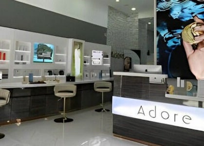 Modern interior of Adore Medispa, Cancún, Quintana Roo, MX, showcasing sleek design and luxurious ambiance.