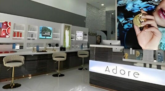 Modern interior of Adore Medispa, Cancún, Quintana Roo, MX, showcasing sleek design and luxurious ambiance.