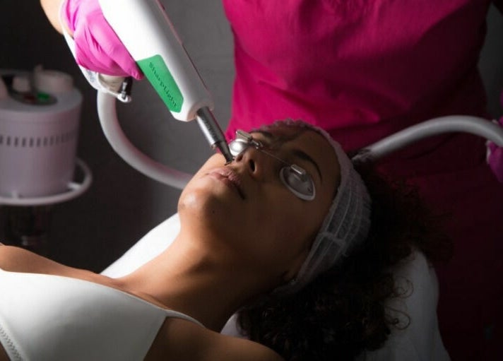 Facial laser treatment at Adore Medispa in Cancún, Quintana Roo, MX, enhancing skincare and wellness.
