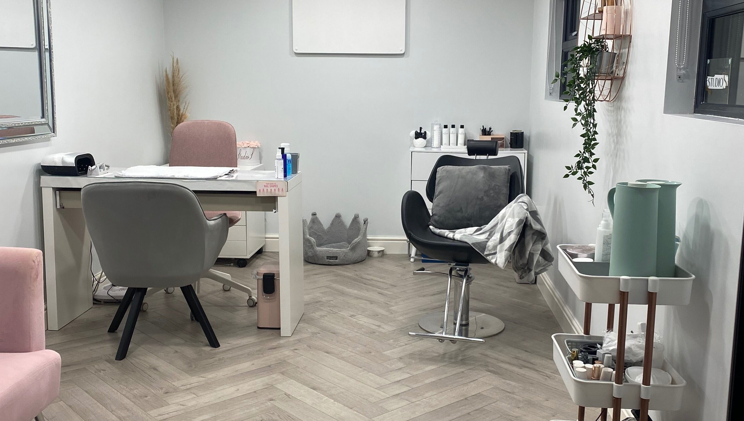 Cozy beauty nook at Studio S, Lucan, County Dublin, IE with modern decor and styling chairs.