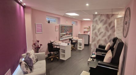 Cozy interior of Brilliance Beauty Salon, Bournemouth, England, GB with nail and seating area.