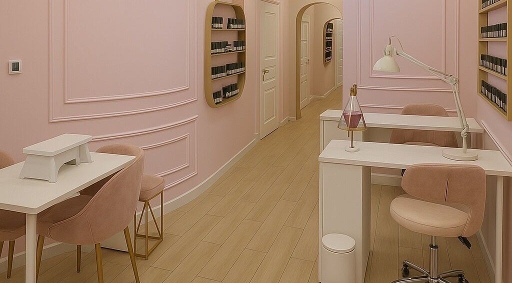 Chic interior of InstaBeauty - Aesthetic & Hair Salon in Dubai, Dubai, AE with pink walls and stylish chairs.