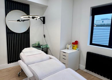 Modern treatment room at Loren Dermody PhiBrows in Carlow, County Carlow, IE, featuring a spa bed and decor.