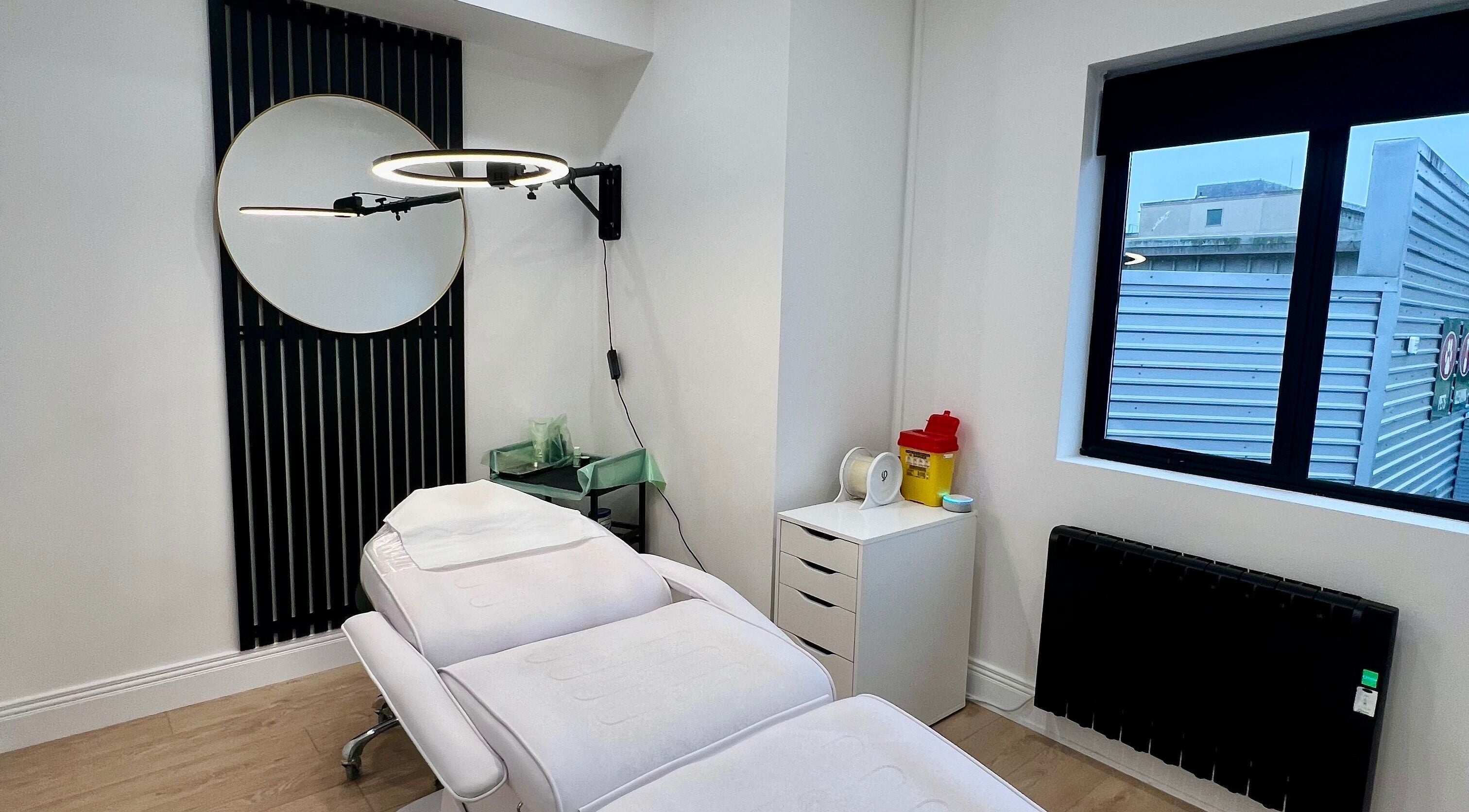 Modern treatment room at Loren Dermody PhiBrows in Carlow, County Carlow, IE, featuring a spa bed and decor.