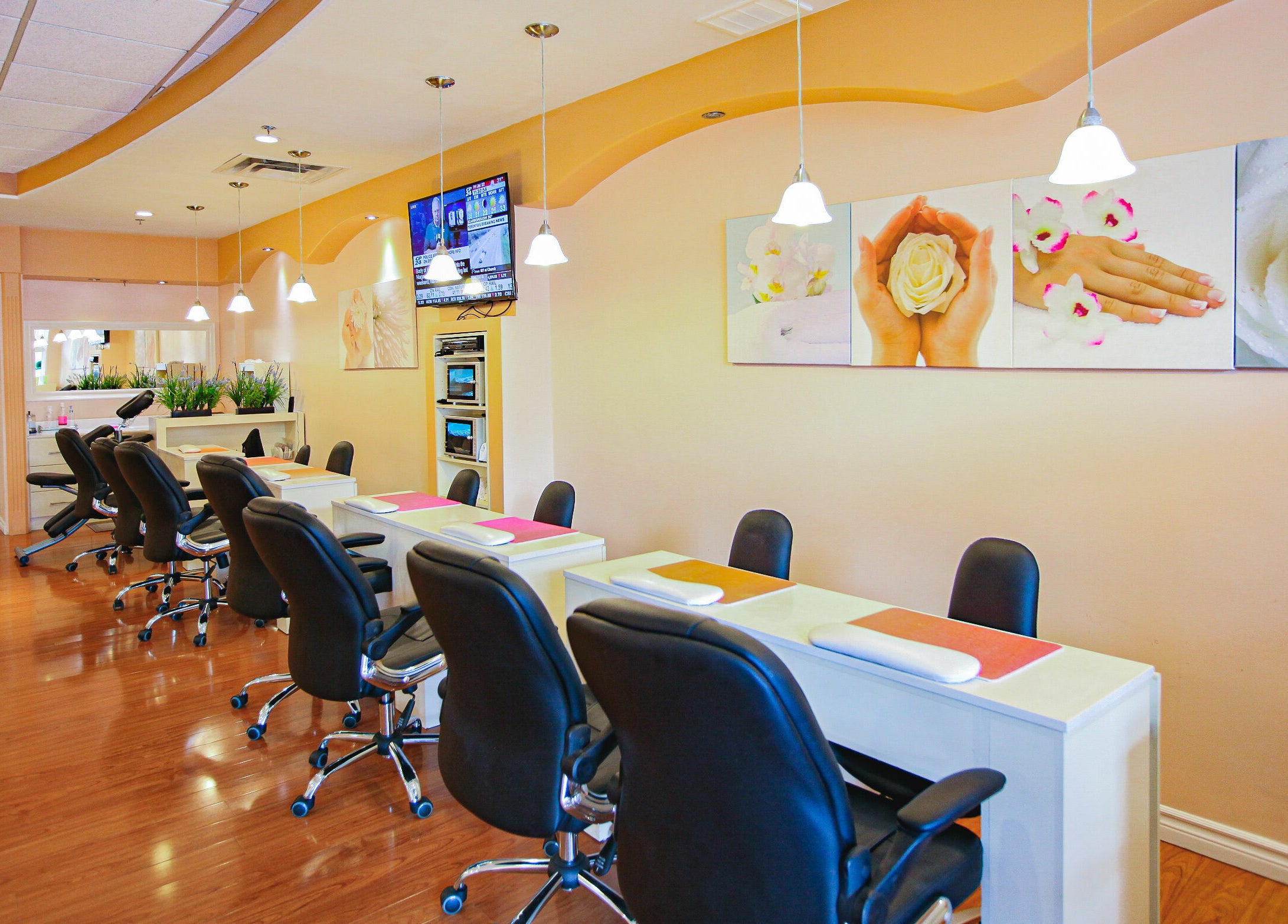 Interior of Pinky Nails and Spa on Davisville showcasing stylish manicure stations in Toronto, Ontario, CA.