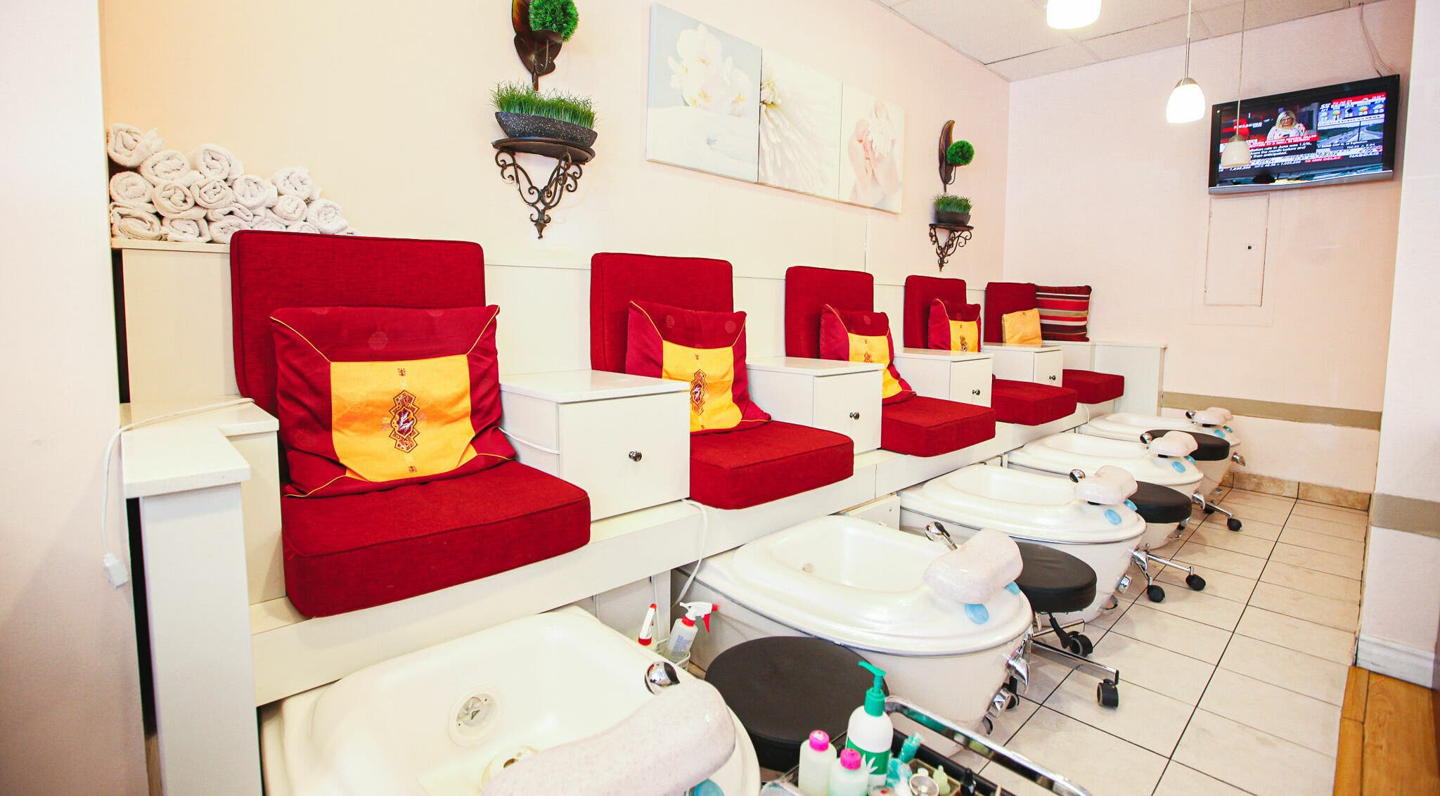Luxurious pedicure chairs at Pinky Nails and Spa on Church St, Toronto, Ontario, CA offer a relaxing experience.