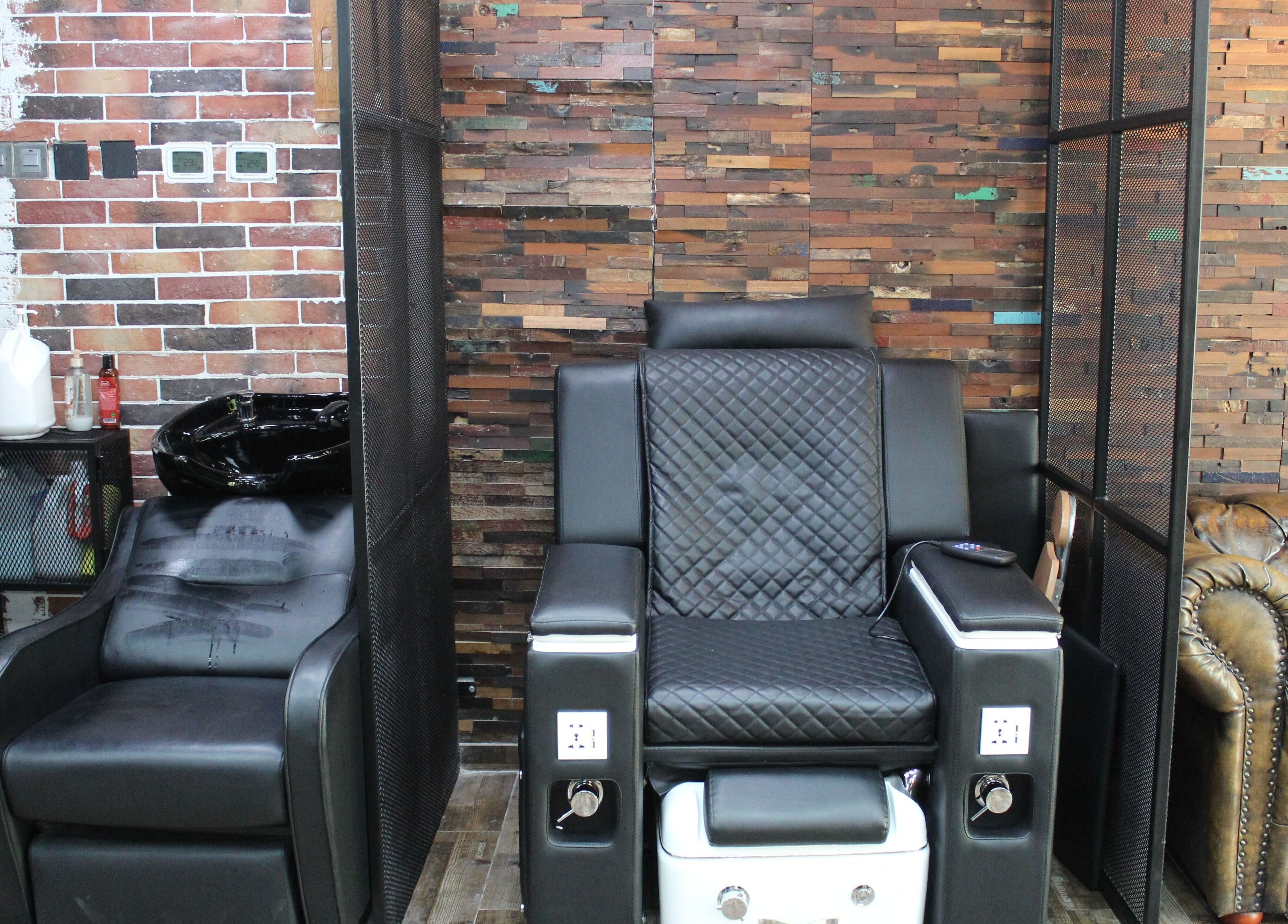 Stylish salon chairs in Tornado Gents Salon - JLT, Dubai, Dubai, AE featuring elegant leather upholstery.