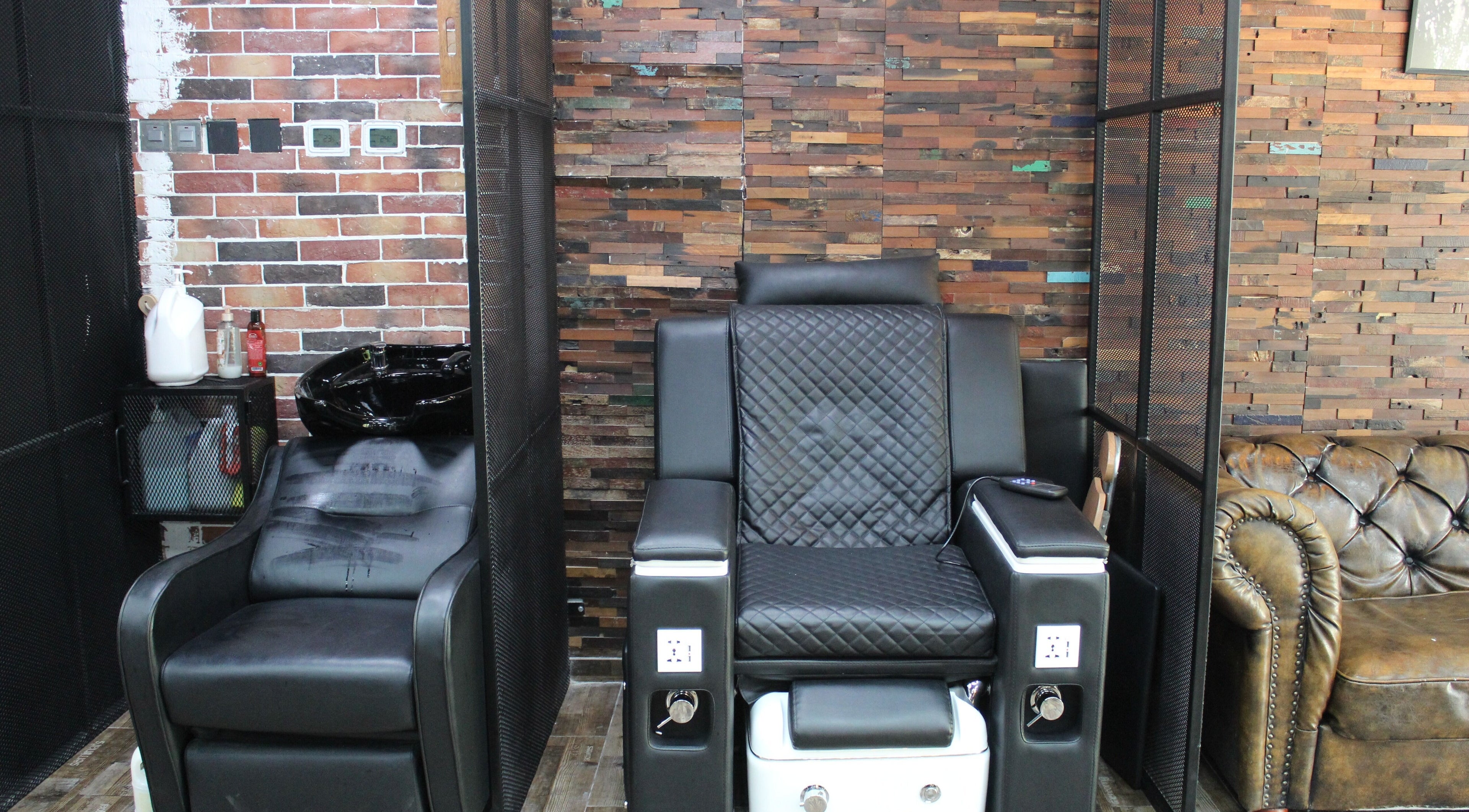 Stylish salon chairs in Tornado Gents Salon - JLT, Dubai, Dubai, AE featuring elegant leather upholstery.