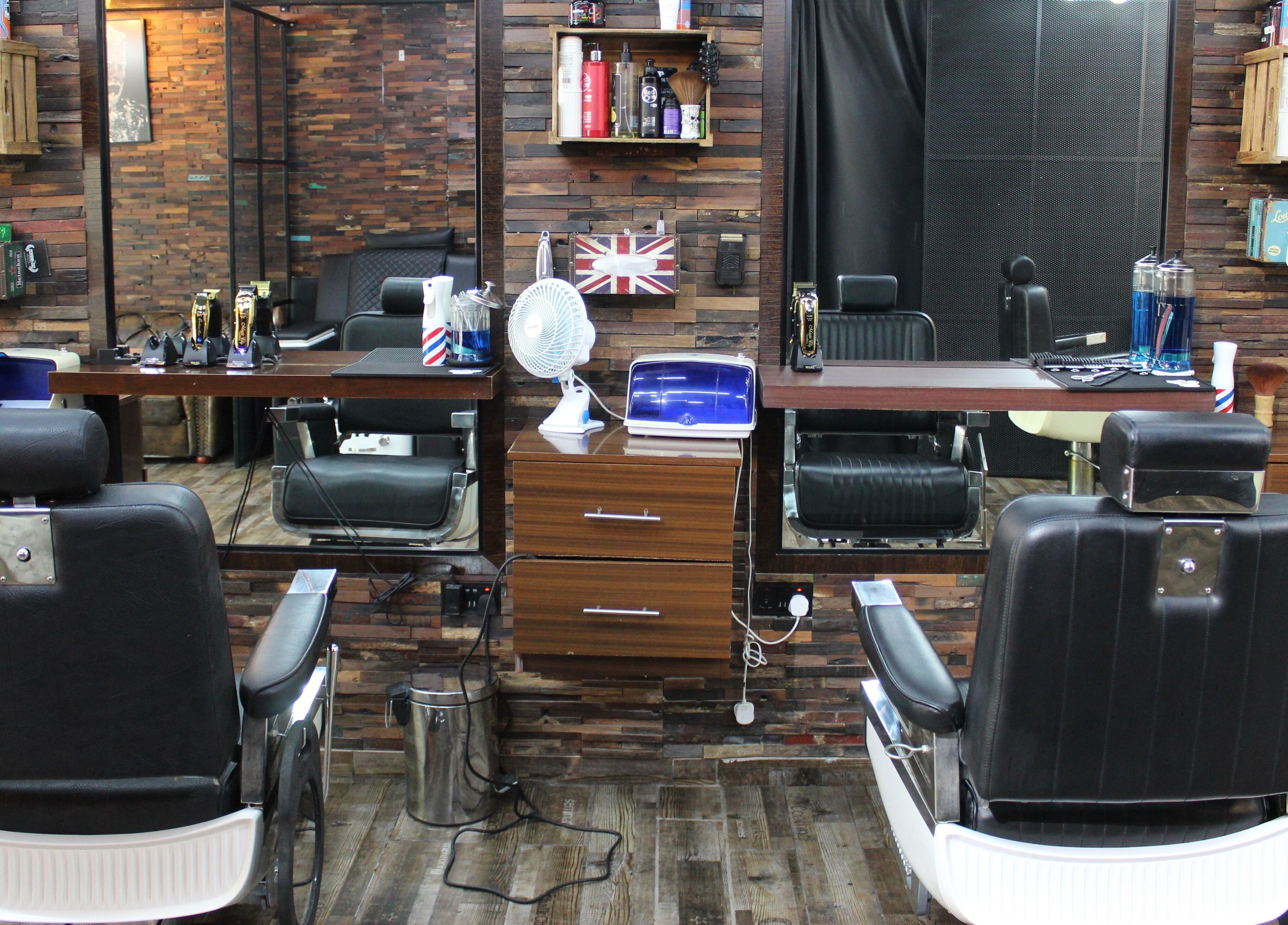 Inside Tornado Gents Salon - JLT in Dubai, Dubai, AE, featuring elegant barber chairs and grooming essentials.