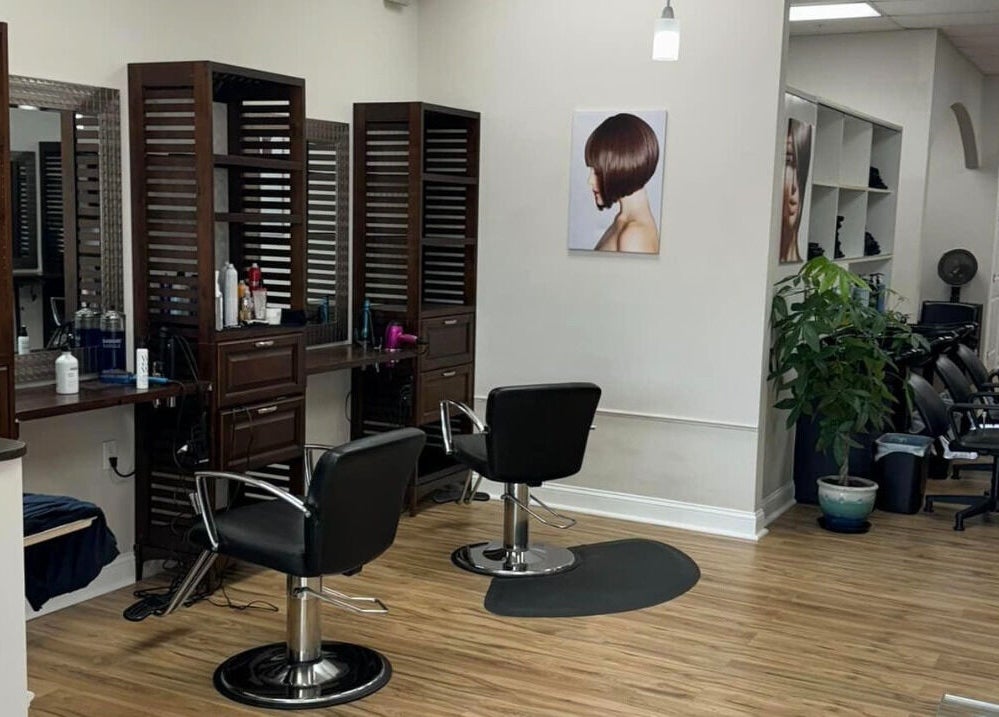 Studio 3 in Naples, Florida offers a modern salon space with styling chairs and elegant interior design.