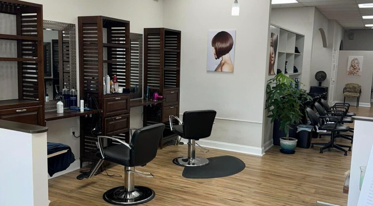 Studio 3 in Naples, Florida offers a modern salon space with styling chairs and elegant interior design.