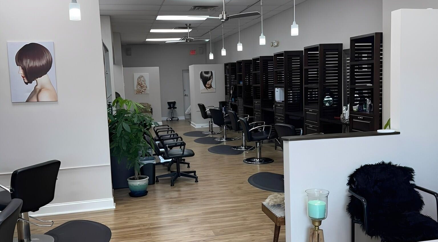 Chic salon interior at Studio 3 in Naples, Florida, US featuring modern styling stations and decor.