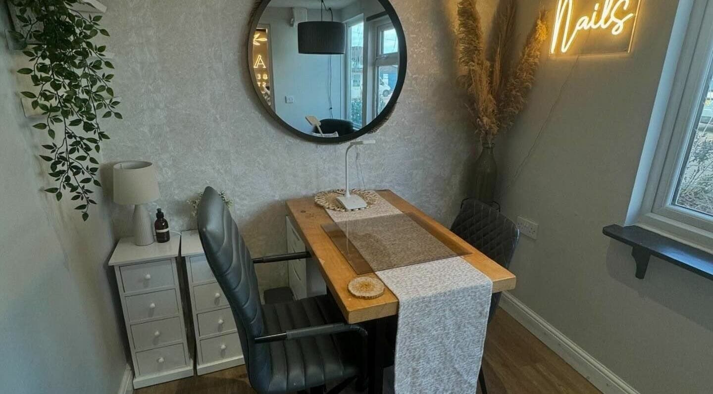 Modern nail station at Adele Faye Beauty Studio, Mile Oak, England, GB with stylish decor and cozy ambiance.