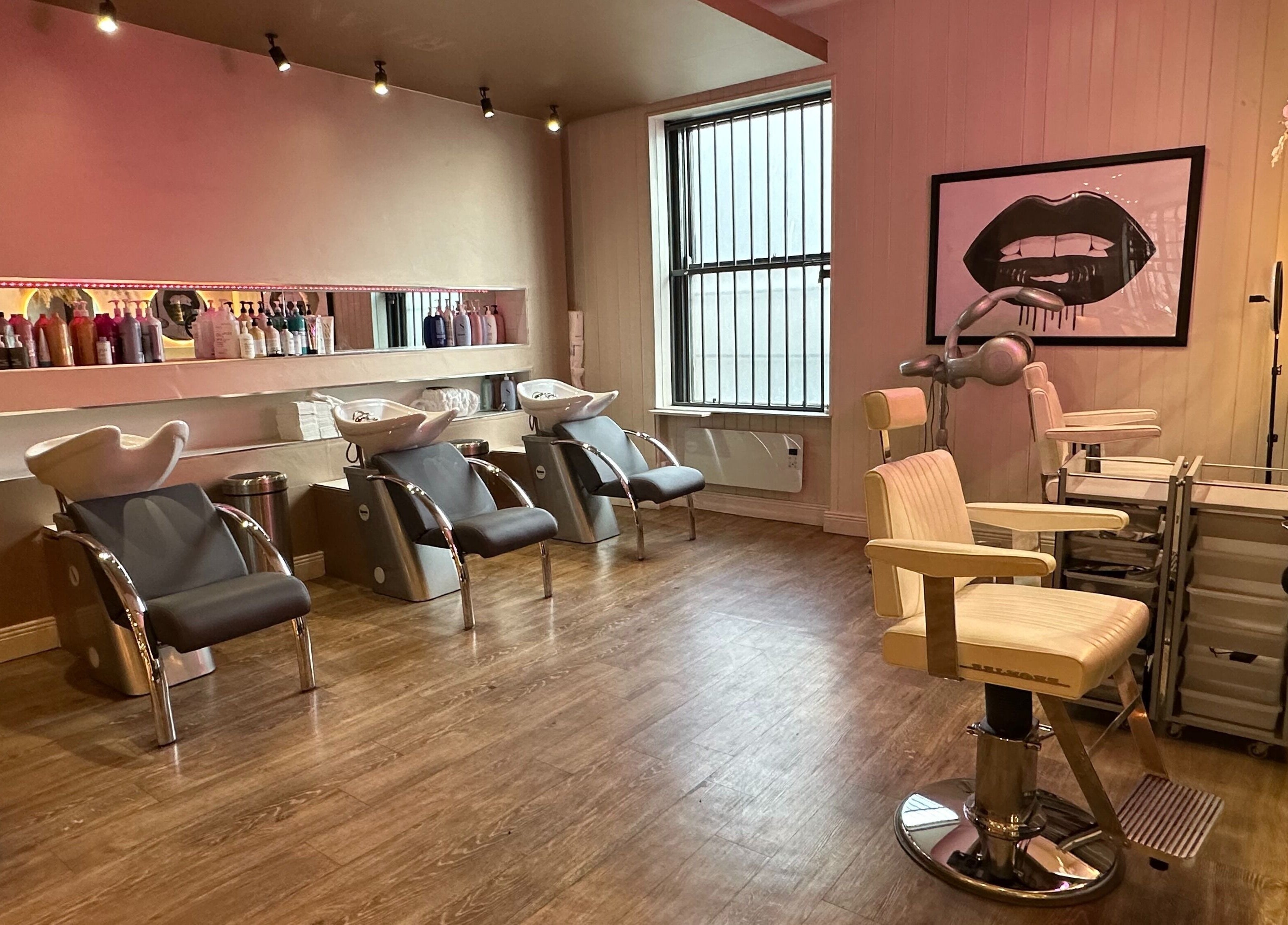 Elegant salon interior of Dry & Fly Wicklow Street in Dublin, County Dublin, IE, showcasing modern hair stations.