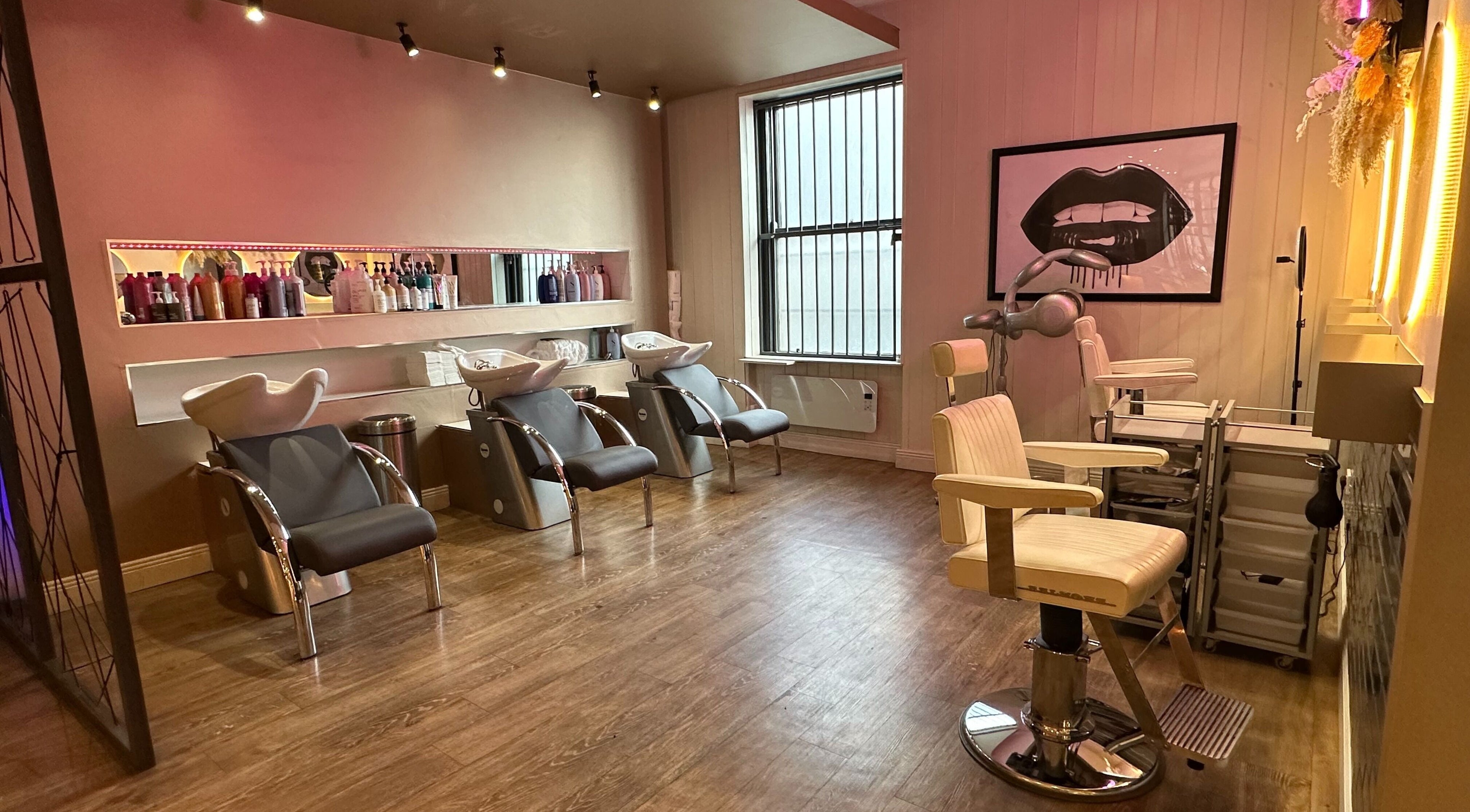 Elegant salon interior of Dry & Fly Wicklow Street in Dublin, County Dublin, IE, showcasing modern hair stations.