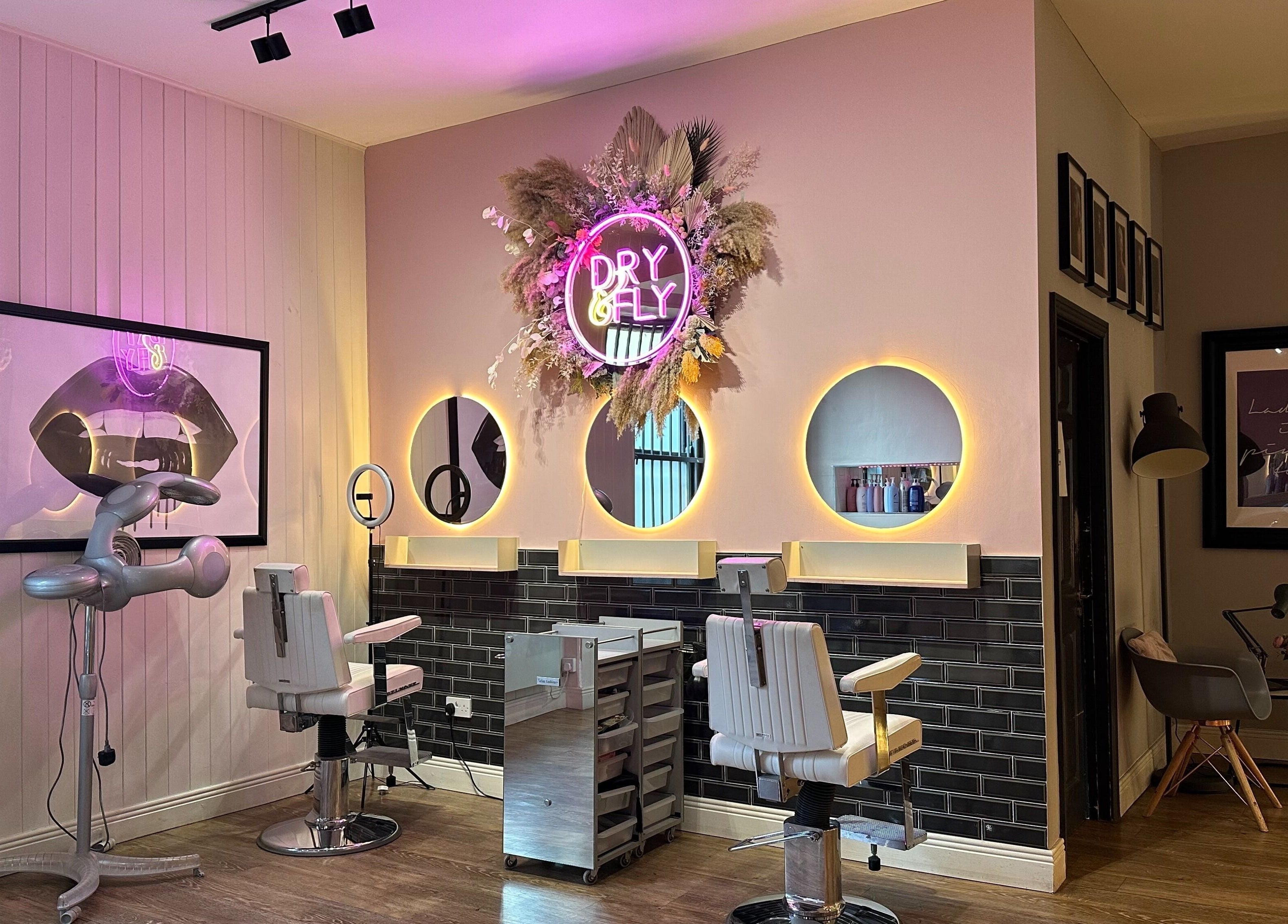 Interior of Dry & Fly Wicklow Street salon in Dublin, offering elegant beauty services with stylish decor.