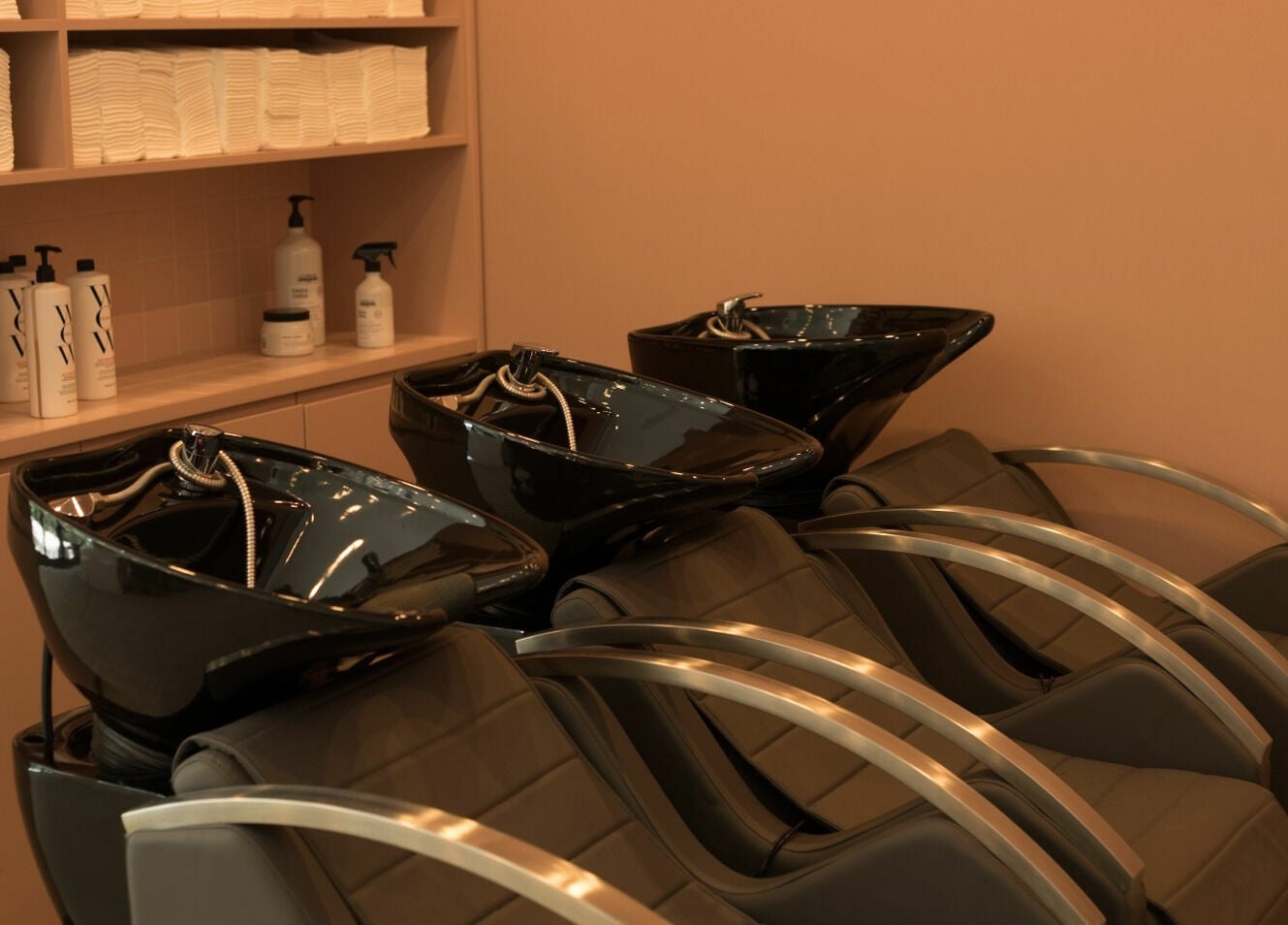 Sleek wash stations at Dry and Fly Spencer Dock, Spencer Dock, County Dublin, IE offering premium hair services.