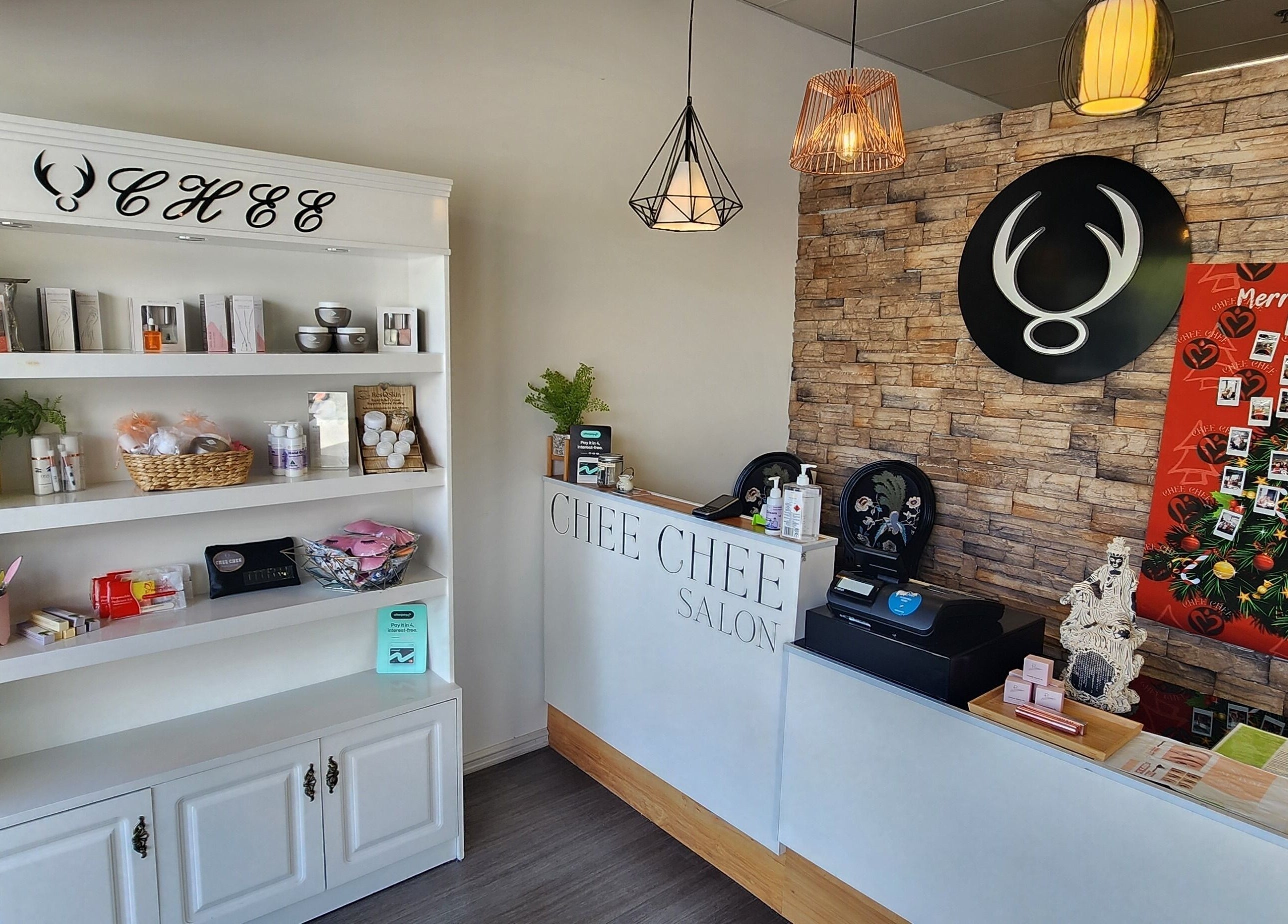 Reception area of Chee Chee Salon in Bayonet Head, Western Australia, AU featuring chic decor and beauty products.