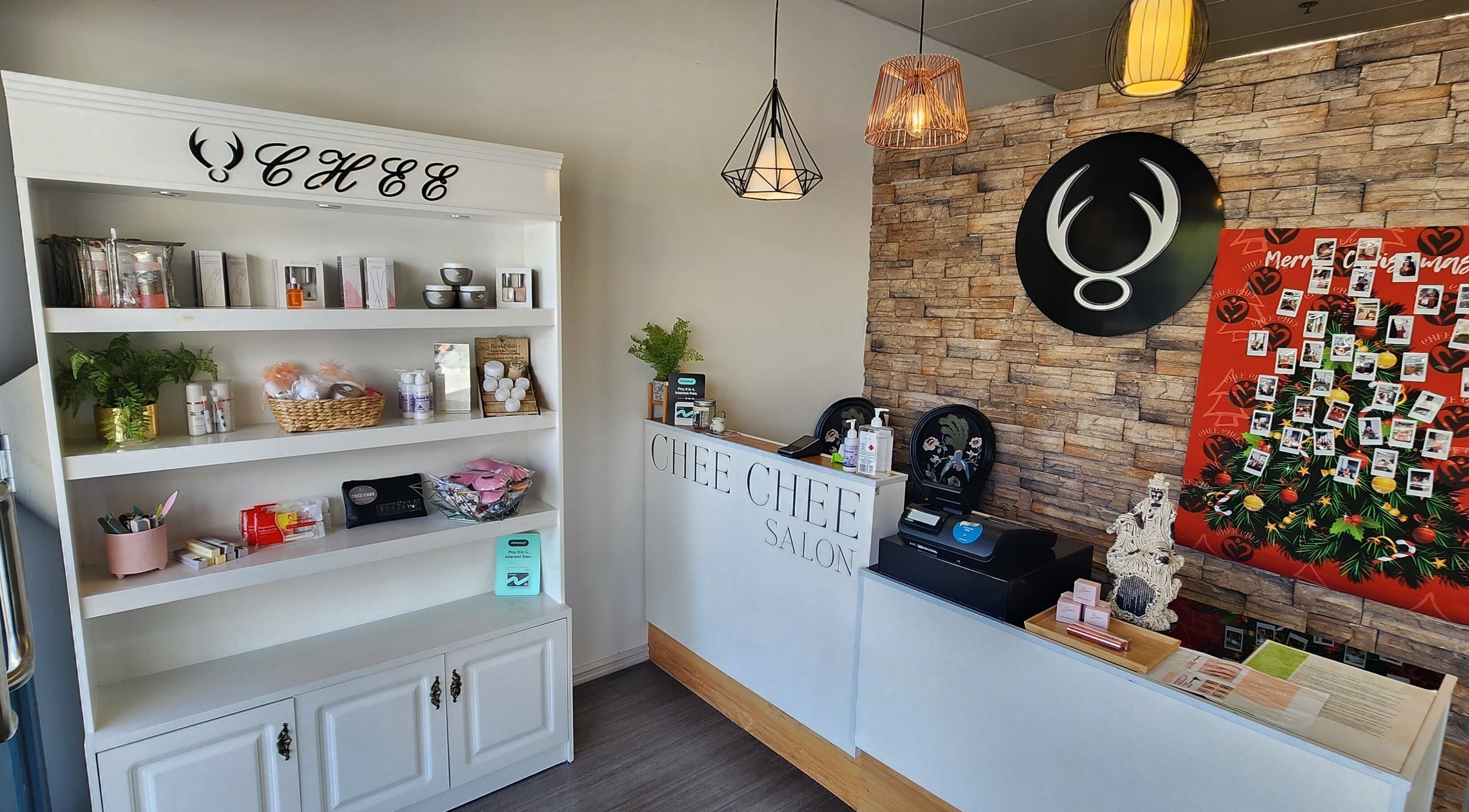 Reception area of Chee Chee Salon in Bayonet Head, Western Australia, AU featuring chic decor and beauty products.