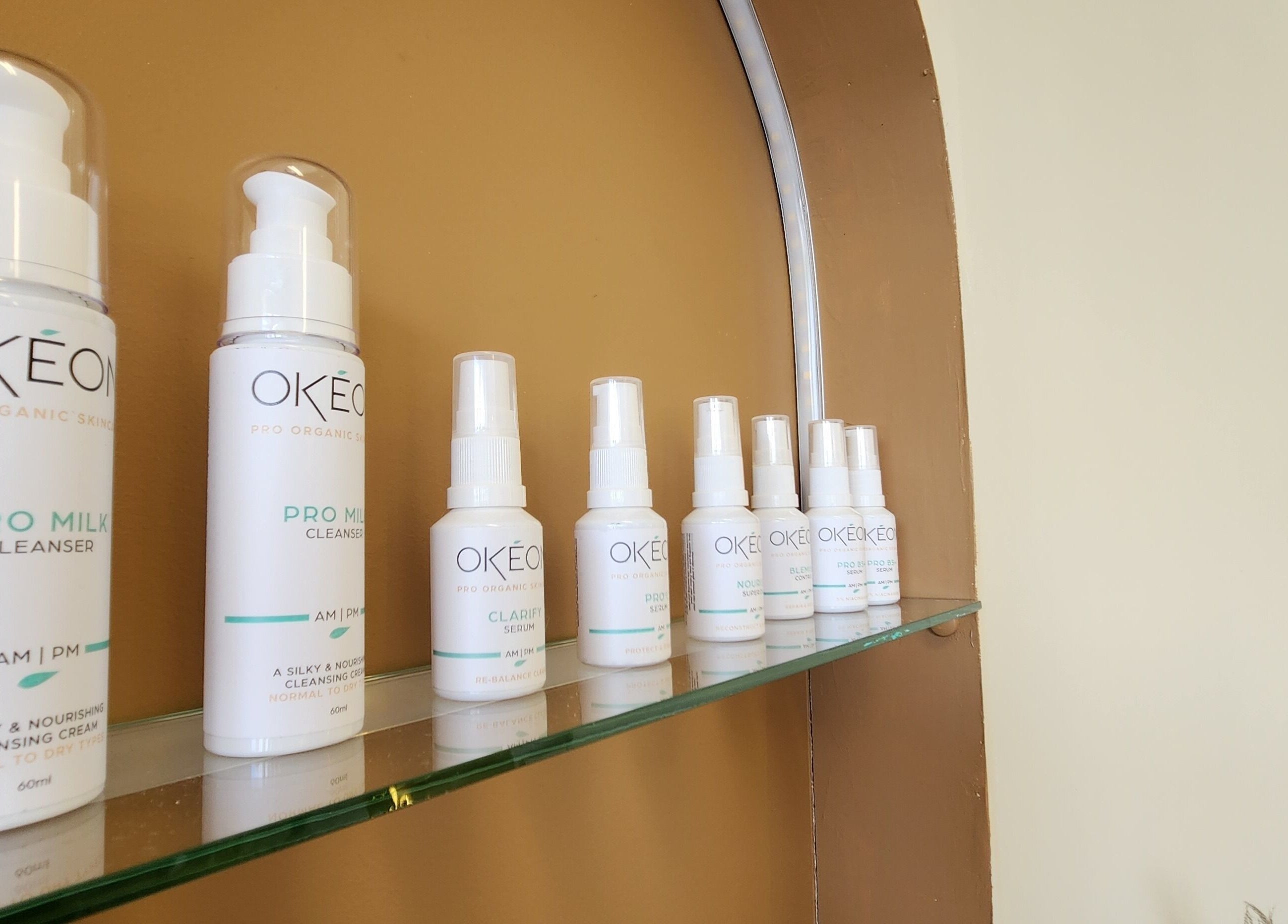 Chee Chee Salon in Bayonet Head, Western Australia displays OKEON skincare products on a sleek glass shelf.
