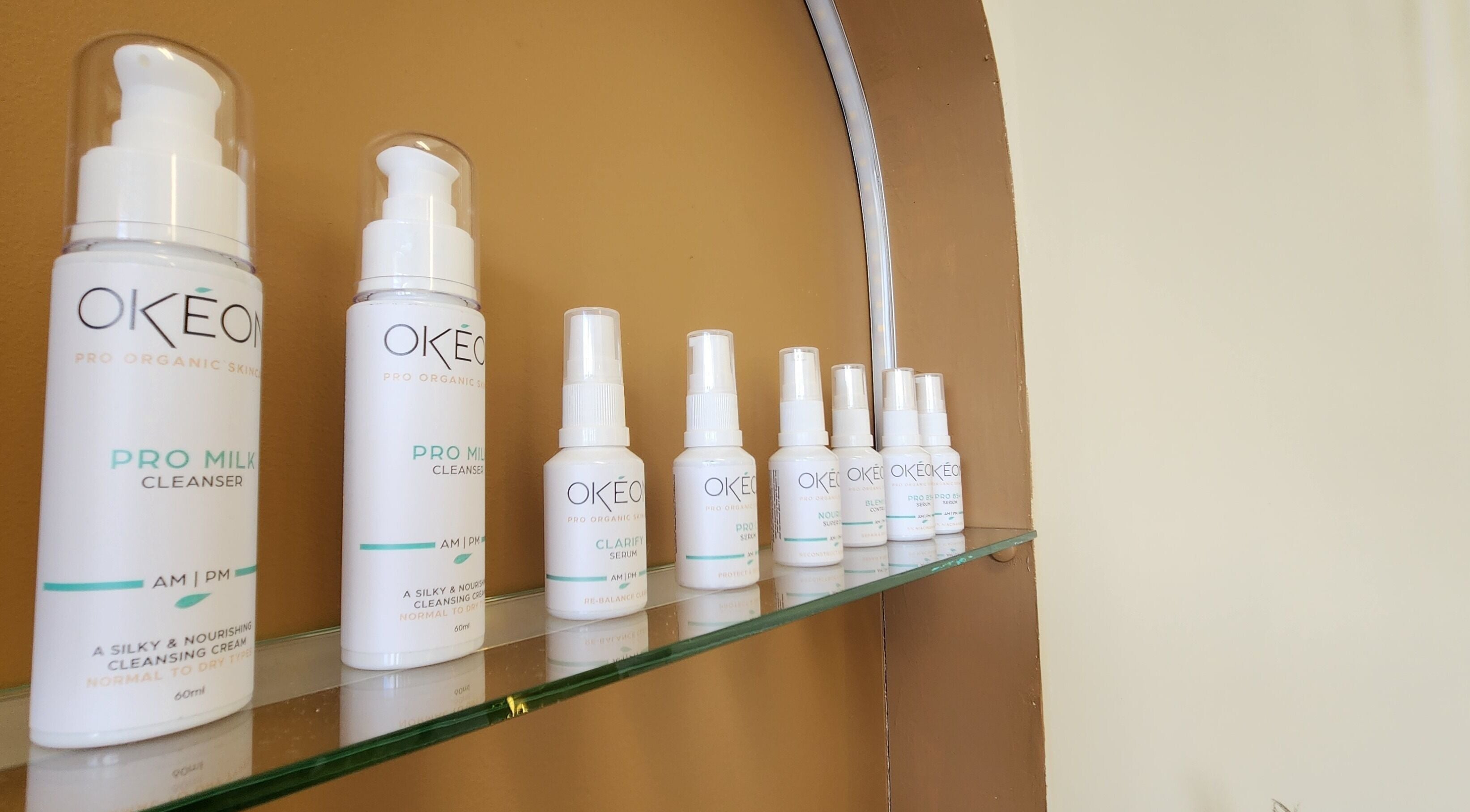 Chee Chee Salon in Bayonet Head, Western Australia displays OKEON skincare products on a sleek glass shelf.