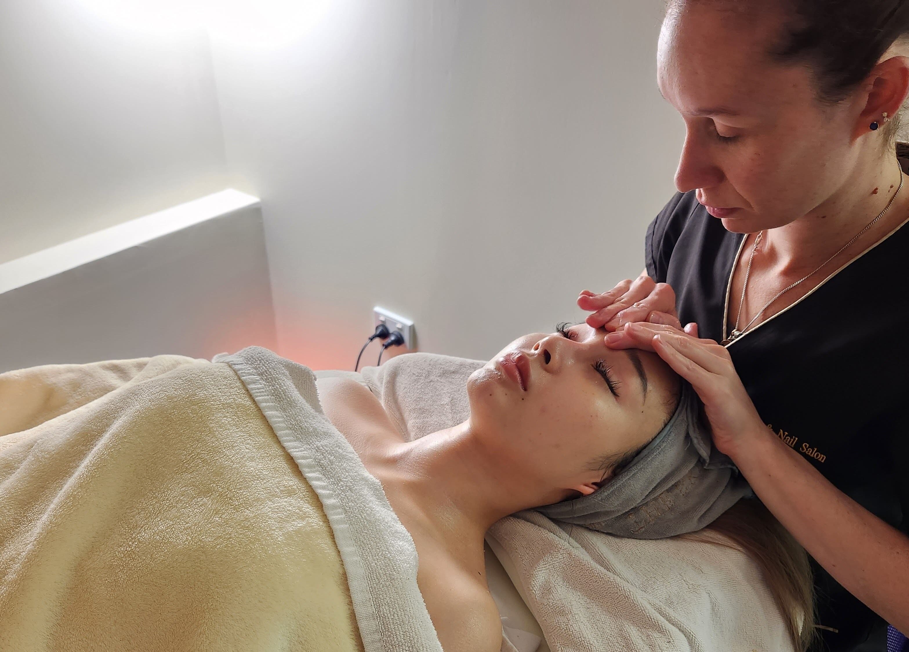 Client receives calming facial massage at Chee Chee Salon, Bayonet Head, Western Australia, AU.