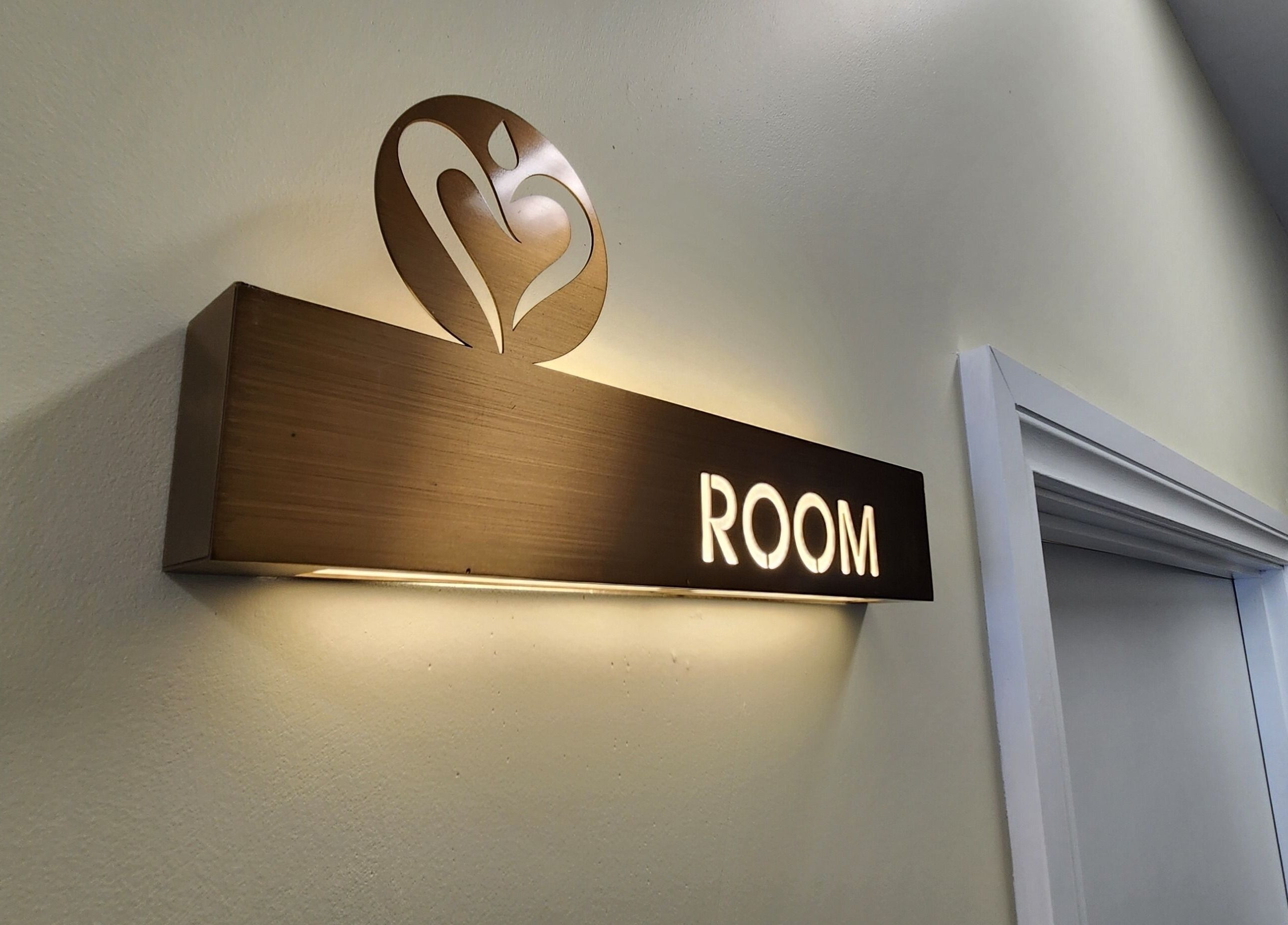 Elegant room sign at Chee Chee Salon, Bayonet Head, Western Australia, AU, enhancing aesthetic appeal.