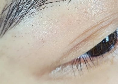 Close-up of expertly shaped eyebrows at ThuLe Beauty, Sydenham, Scotland, GB.