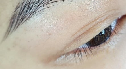 Close-up of expertly shaped eyebrows at ThuLe Beauty, Sydenham, Scotland, GB.