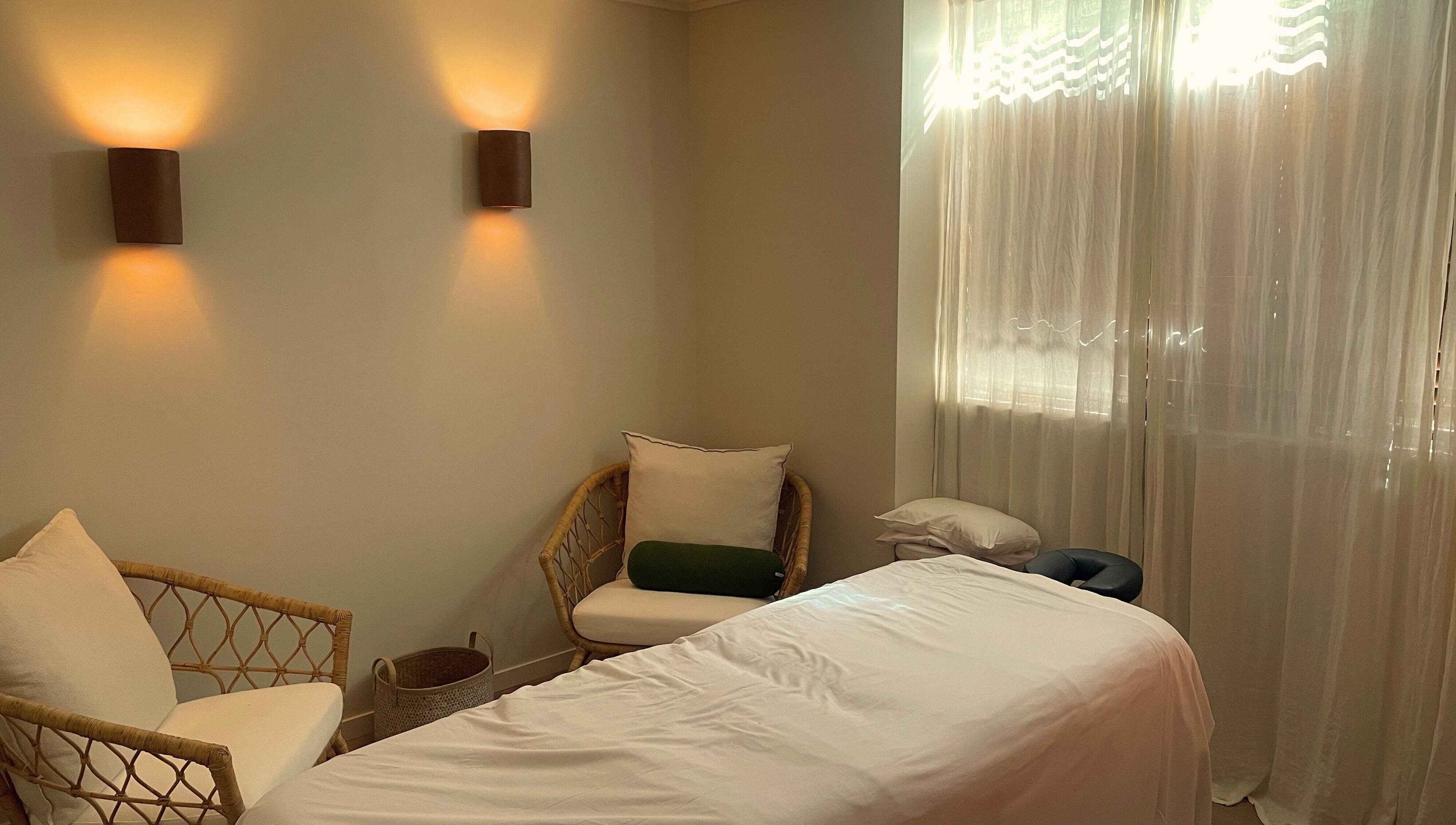 Peaceful treatment room at Heart and Soul Wellness Centre, Otford, New South Wales, AU with soft lighting.