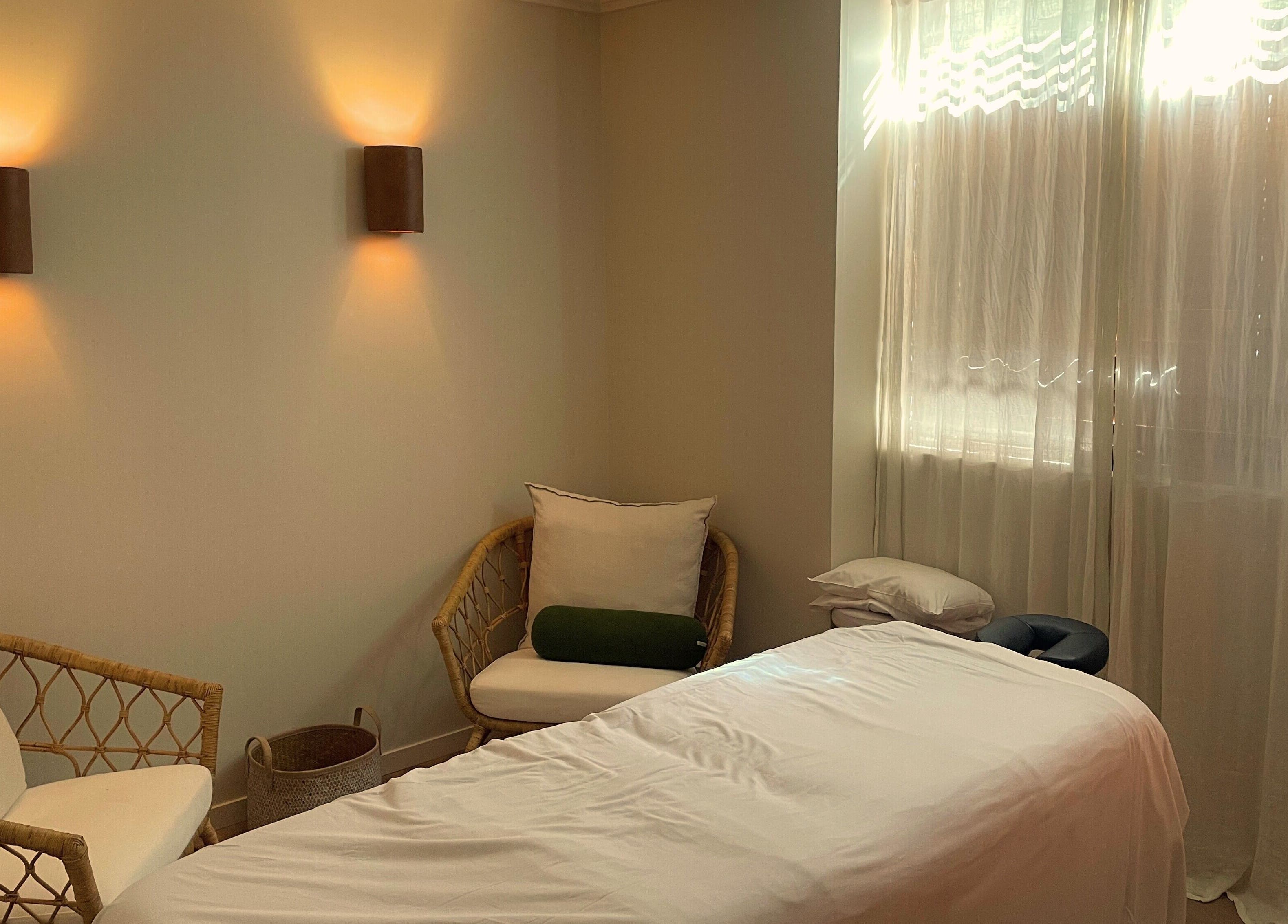 Peaceful treatment room at Heart and Soul Wellness Centre, Otford, New South Wales, AU with soft lighting.