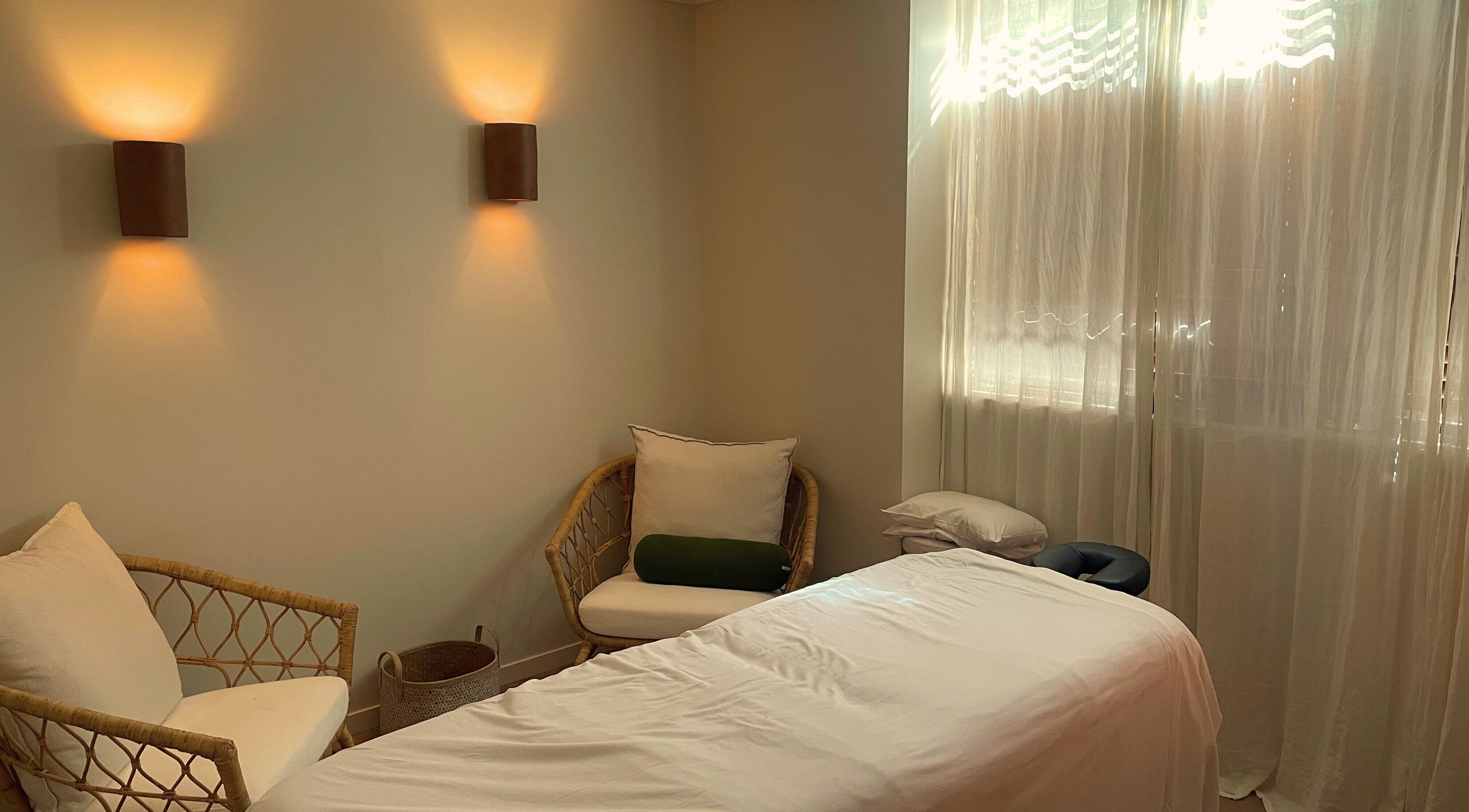 Peaceful treatment room at Heart and Soul Wellness Centre, Otford, New South Wales, AU with soft lighting.