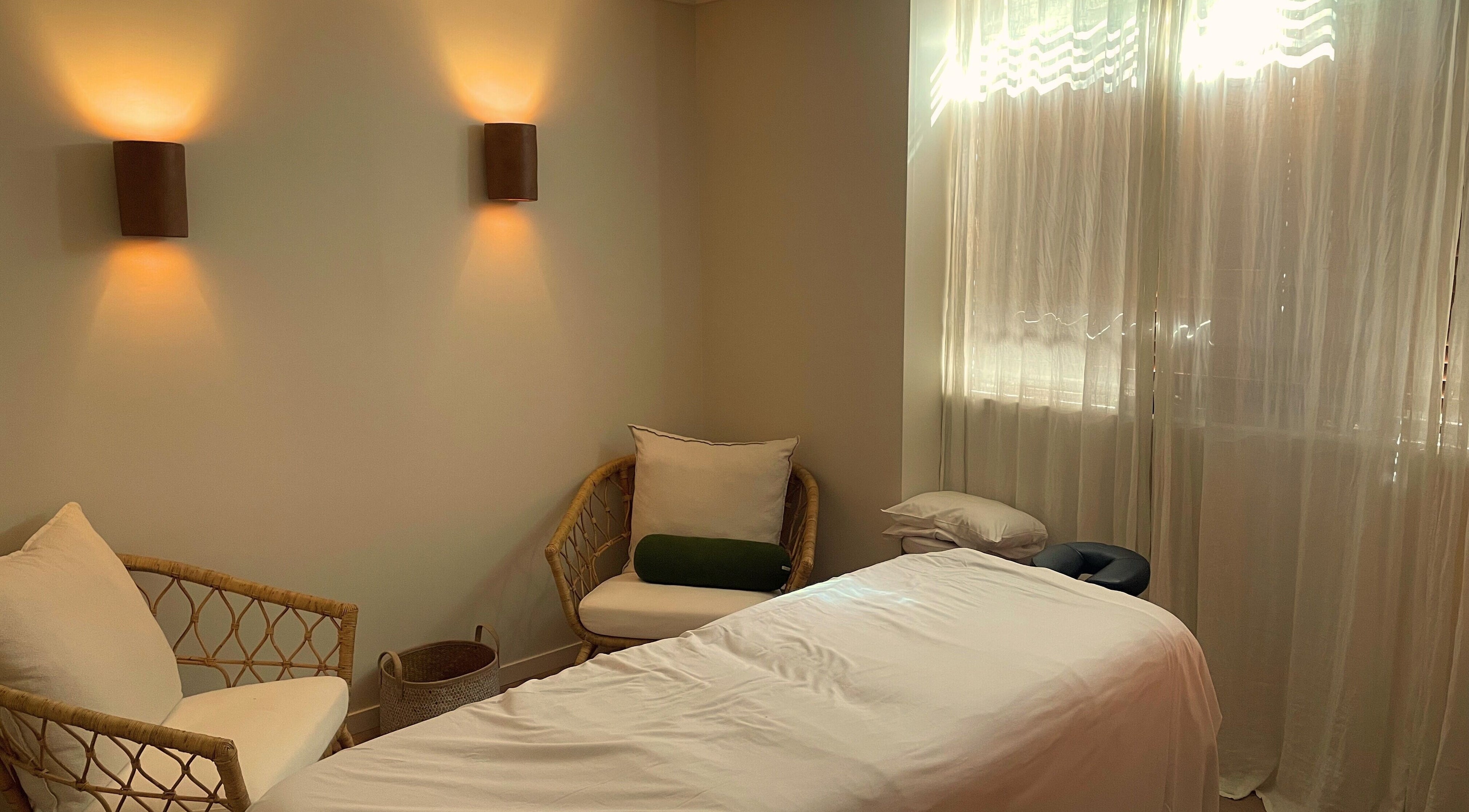 Peaceful treatment room at Heart and Soul Wellness Centre, Otford, New South Wales, AU with soft lighting.