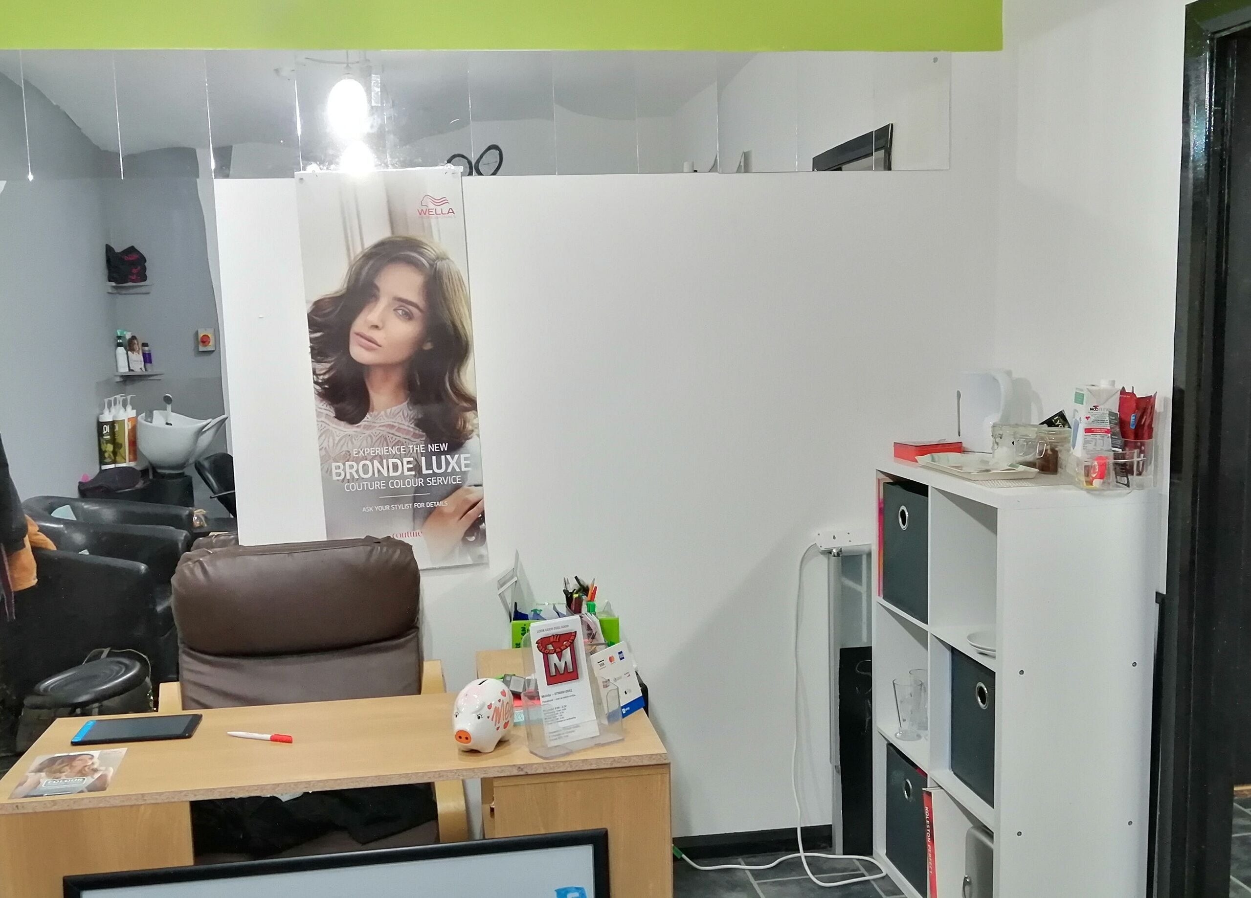 Interior of Mel at Salon Arriba in Stoke-on-Trent, England, GB, showcasing a stylish hairdressing area.