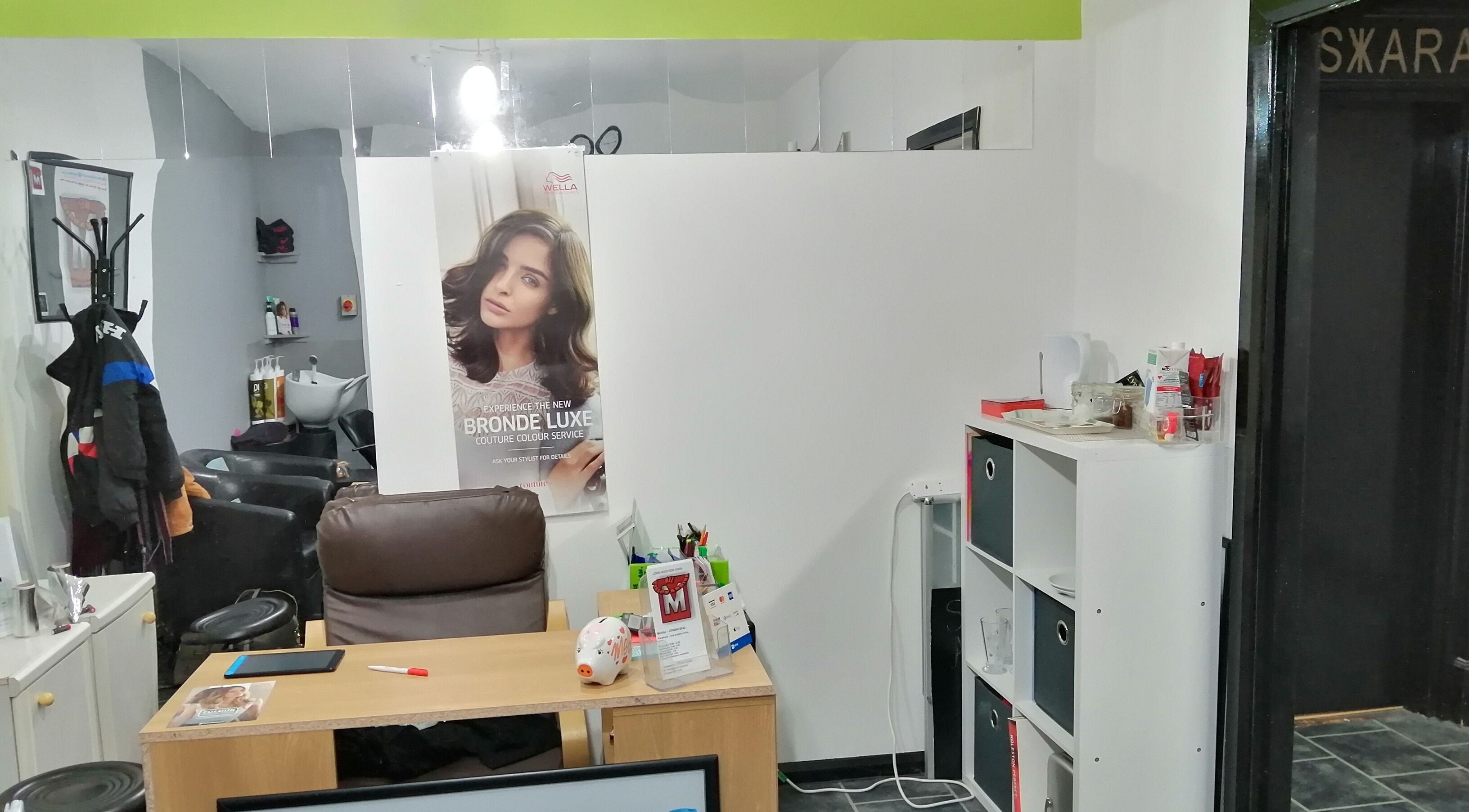Interior of Mel at Salon Arriba in Stoke-on-Trent, England, GB, showcasing a stylish hairdressing area.
