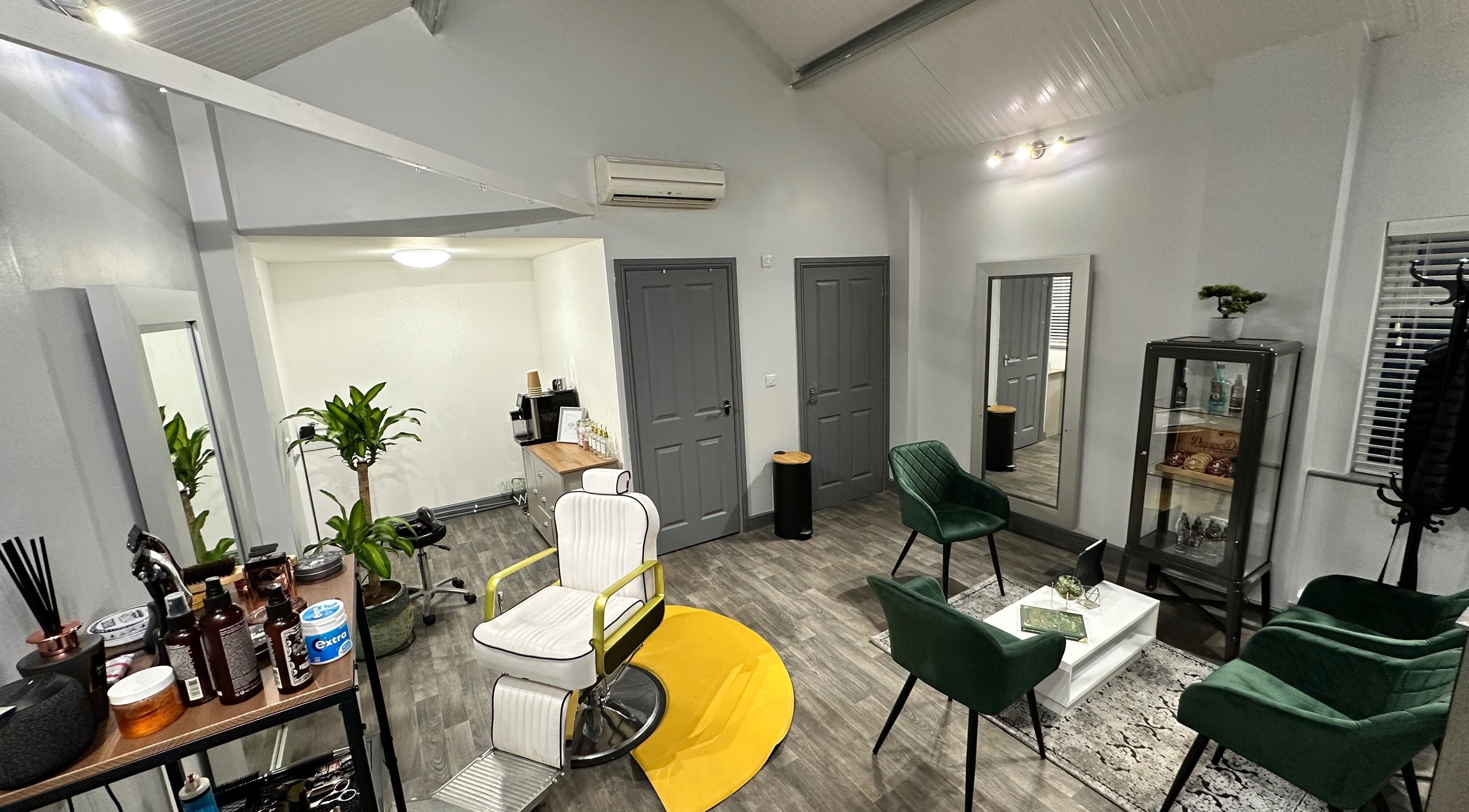 Sleek salon interior with stylish decor at The Skinned Lid in Huddersfield, England, GB.