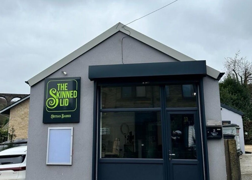 The Skinned Lid entrance in Huddersfield, England, featuring its modern design.