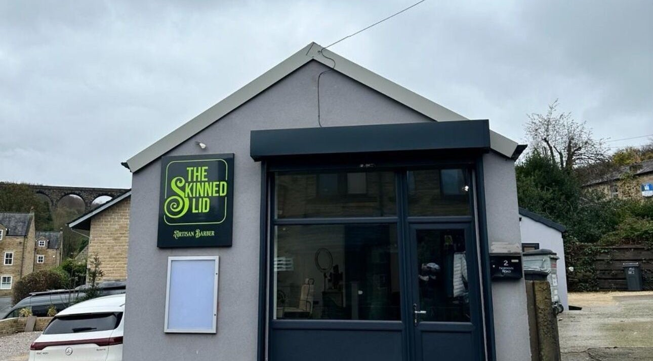 The Skinned Lid entrance in Huddersfield, England, featuring its modern design.