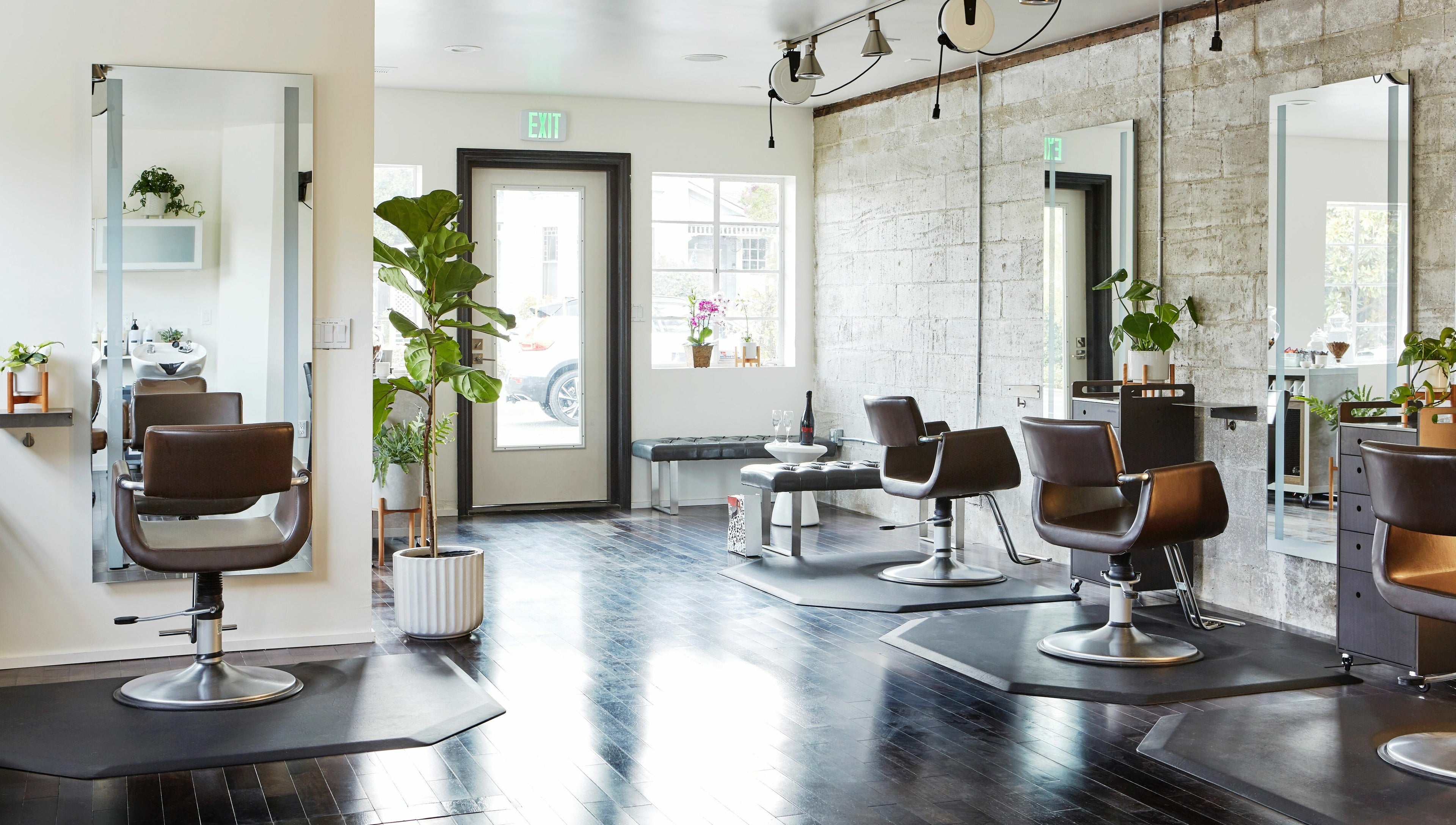 Modern salon design at Wavelength Salon in Los Gatos, California, US with stylish chairs and decor.