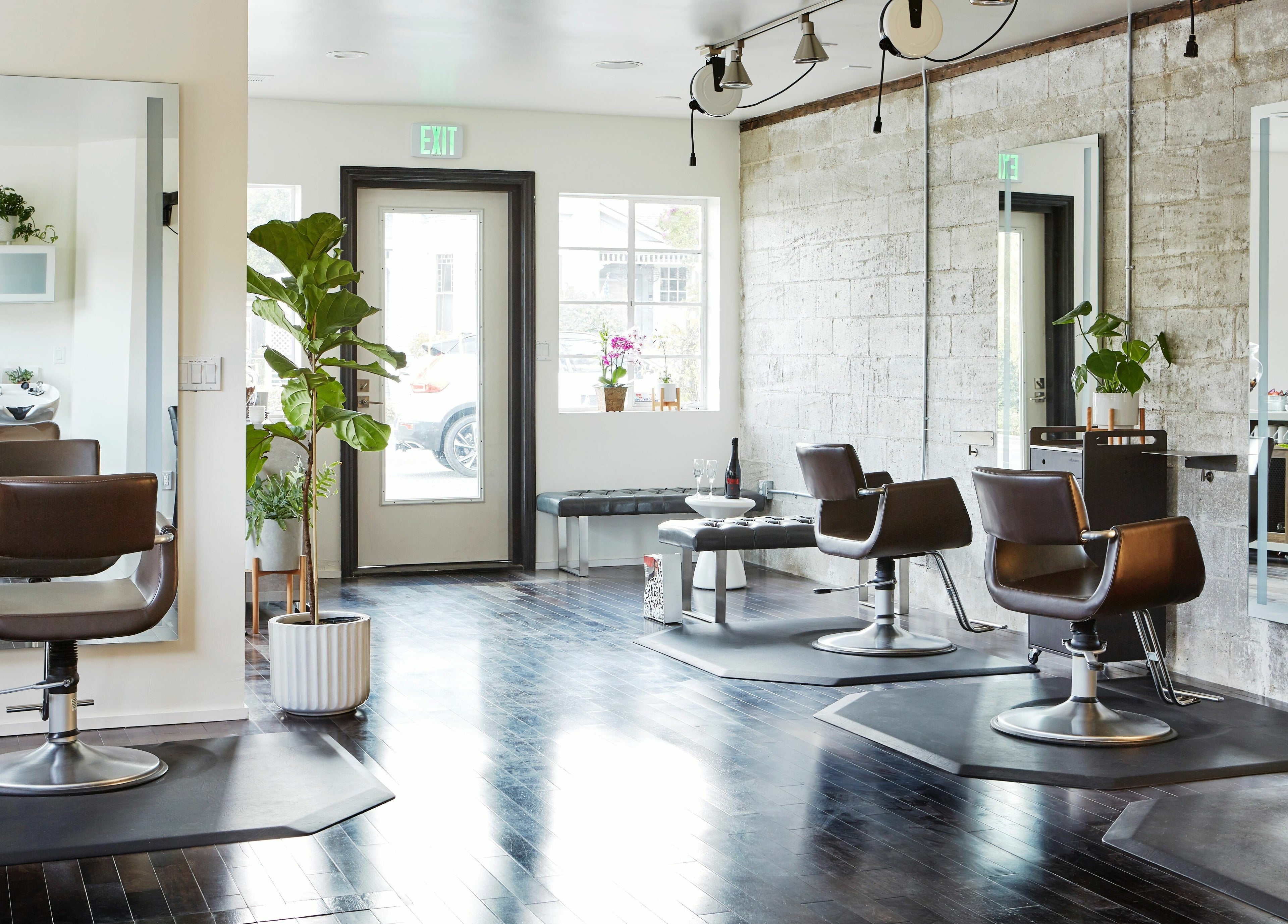 Modern salon design at Wavelength Salon in Los Gatos, California, US with stylish chairs and decor.