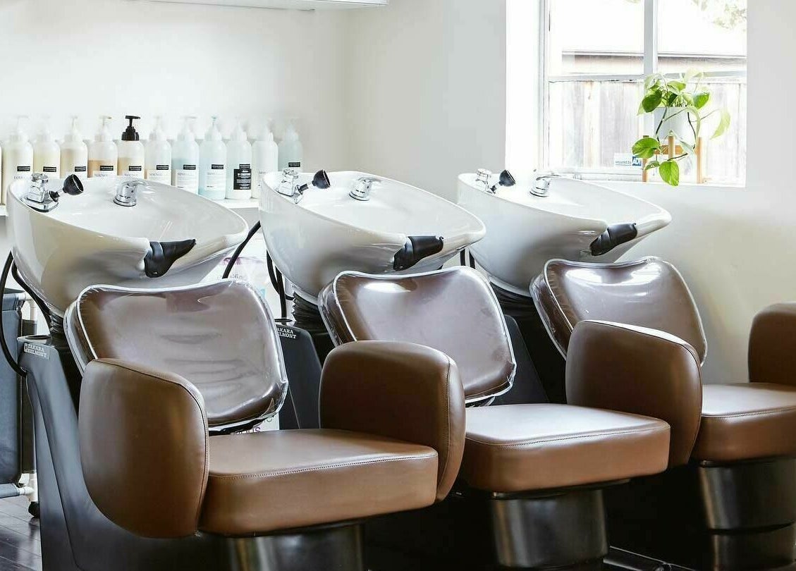 Elegant shampoo chairs at Wavelength Salon, Los Gatos, California, US, enhancing client comfort.