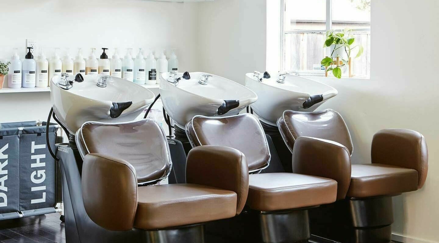 Elegant shampoo chairs at Wavelength Salon, Los Gatos, California, US, enhancing client comfort.