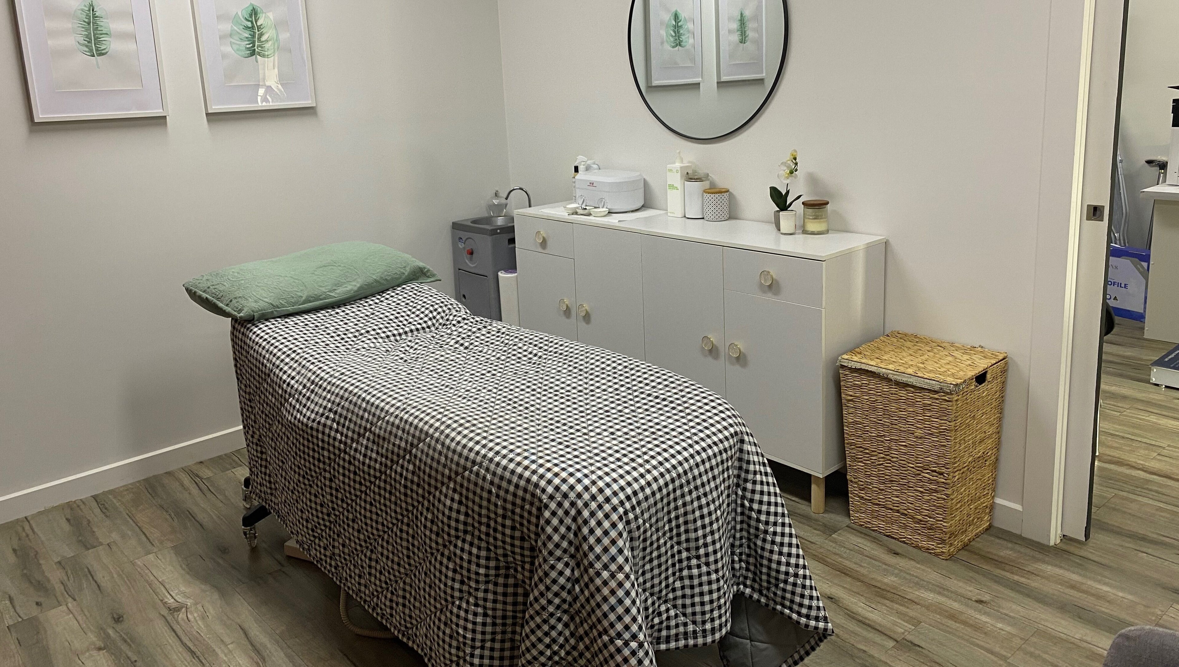 Cozy spa room at MKT Beauty, Kerang, Victoria, AU featuring a treatment bed and elegant decor.