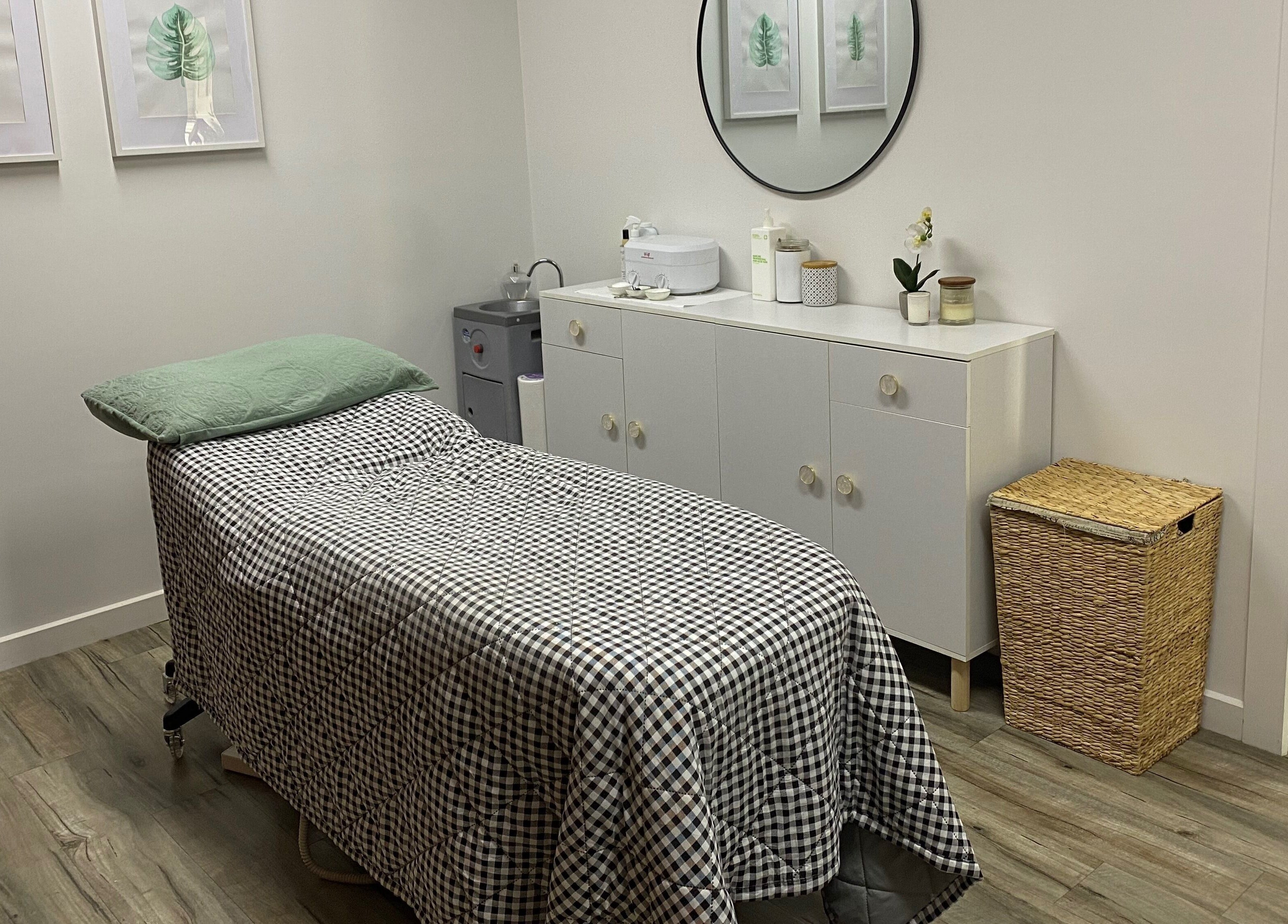 Cozy spa room at MKT Beauty, Kerang, Victoria, AU featuring a treatment bed and elegant decor.
