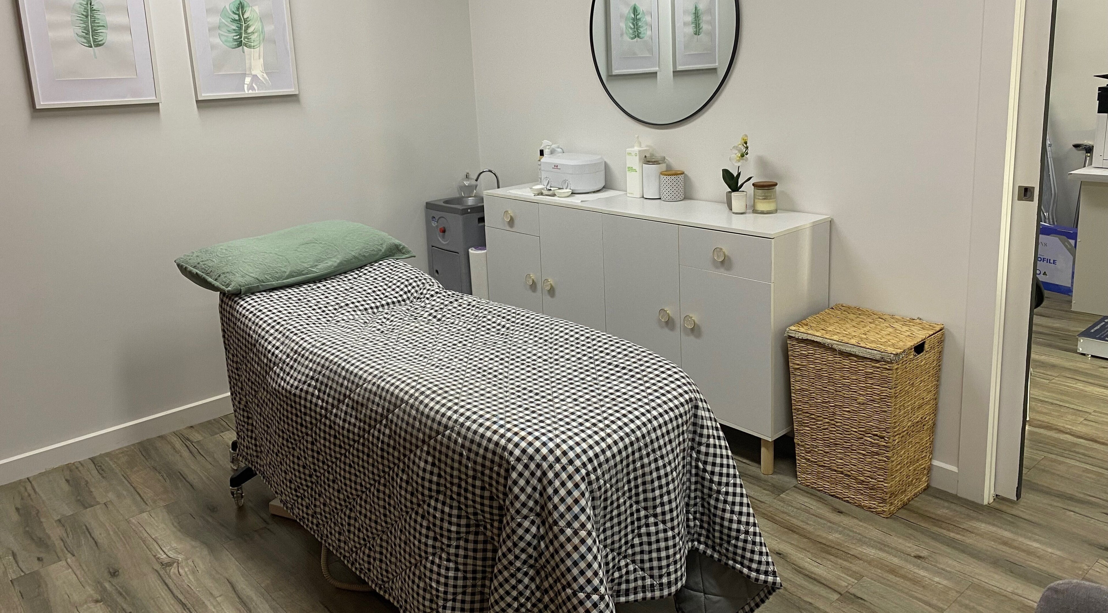 Cozy spa room at MKT Beauty, Kerang, Victoria, AU featuring a treatment bed and elegant decor.