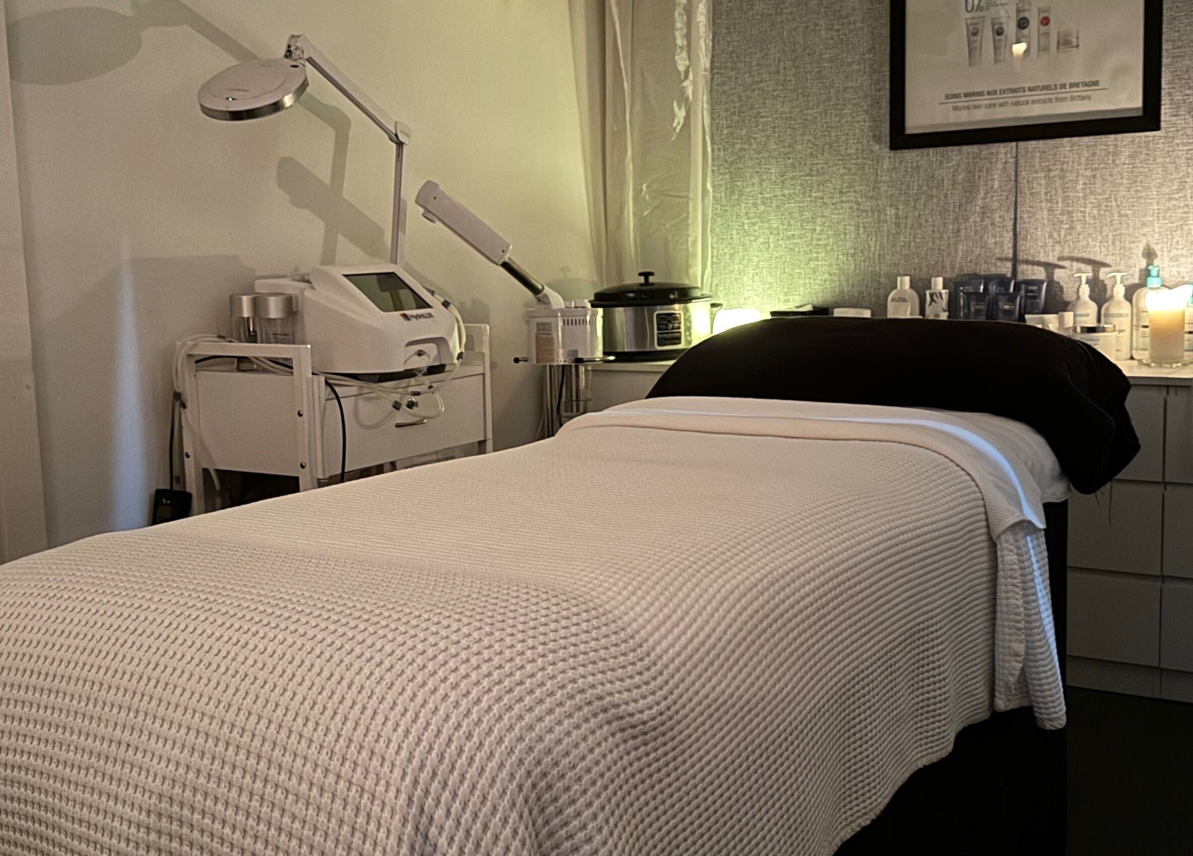 Cozy treatment room at Tocumwal Skin & Body, Tocumwal, New South Wales, AU, featuring a massage table and beauty equipment.