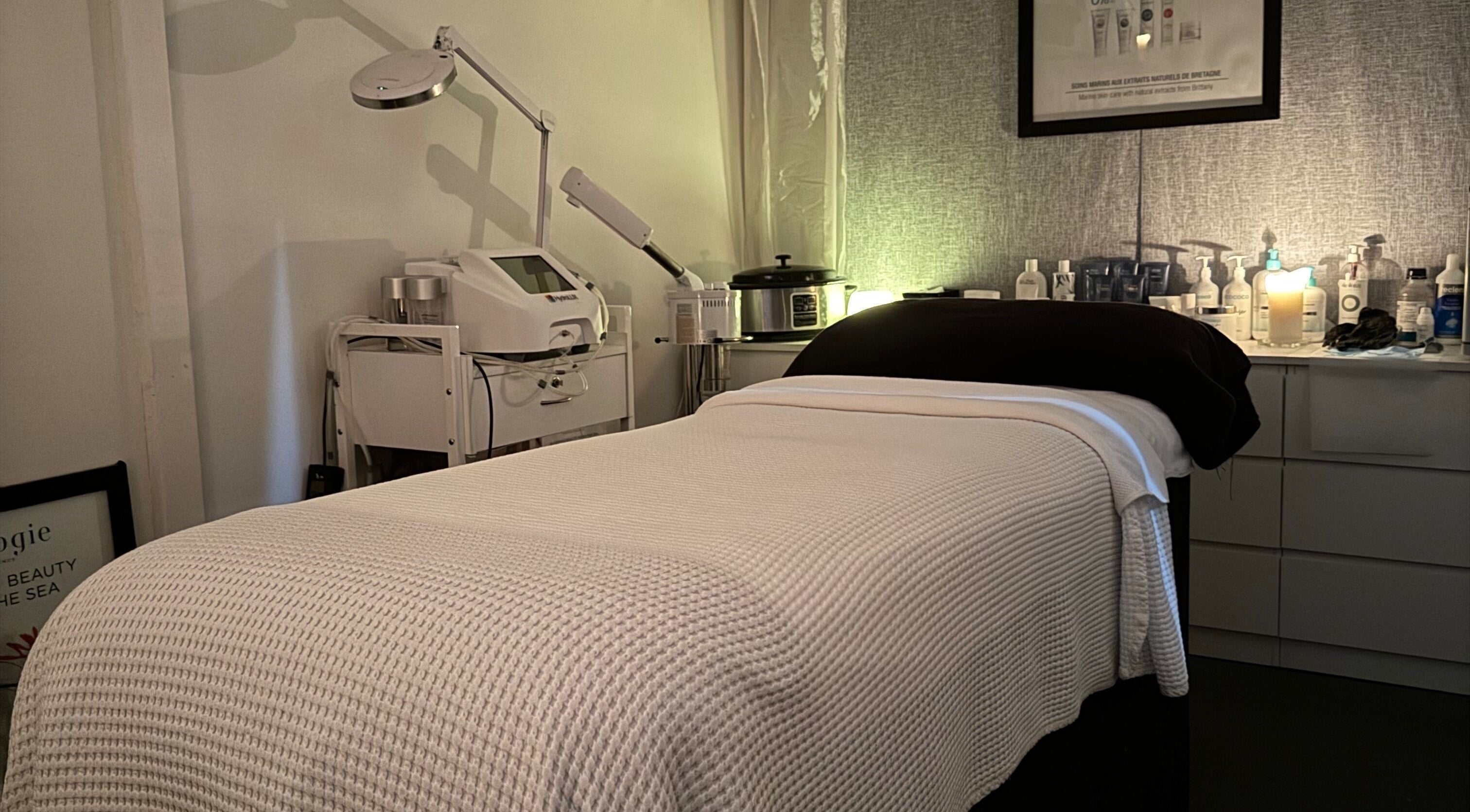 Cozy treatment room at Tocumwal Skin & Body, Tocumwal, New South Wales, AU, featuring a massage table and beauty equipment.