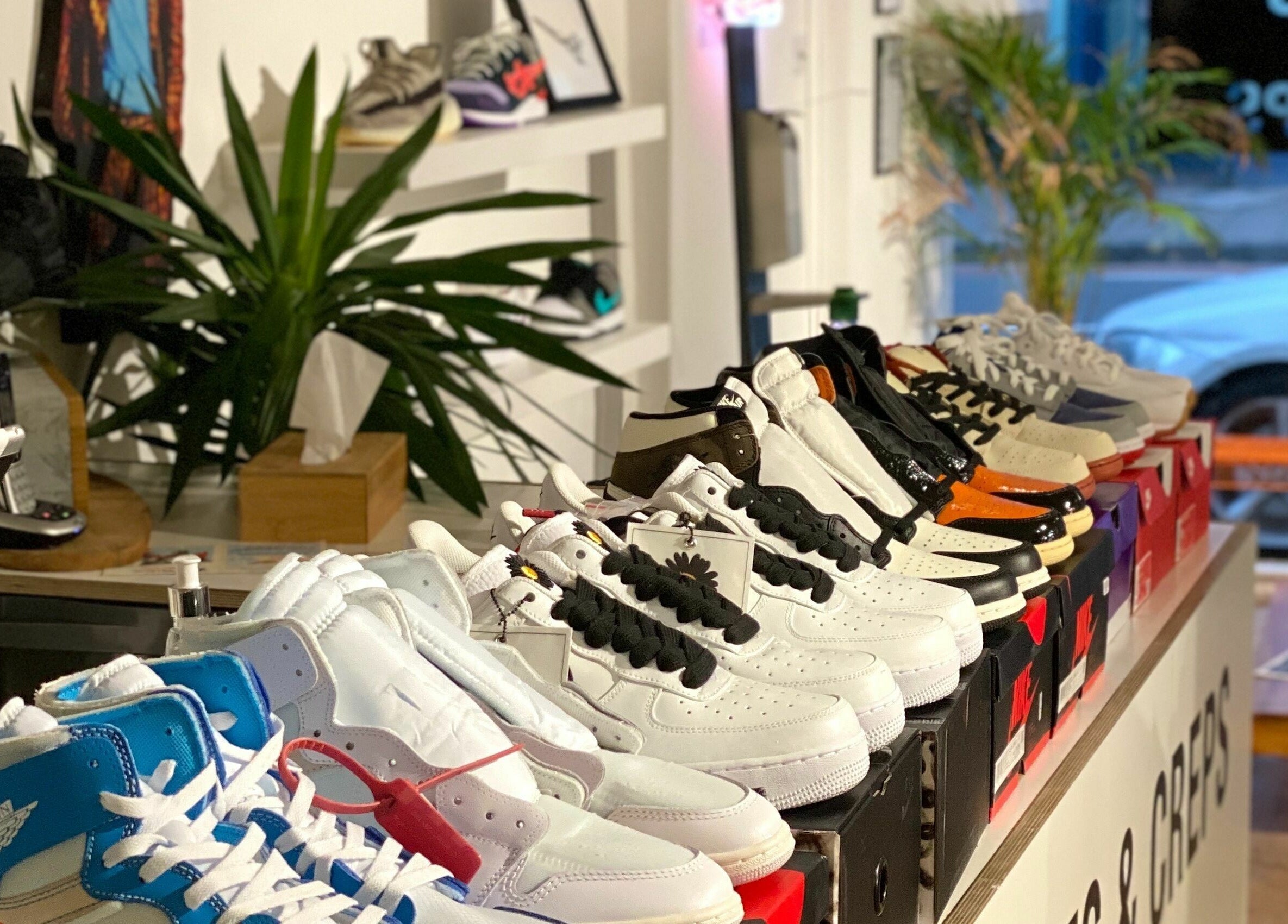 Diverse sneaker collection displayed at Cuts and Creps in Bristol, England, GB.