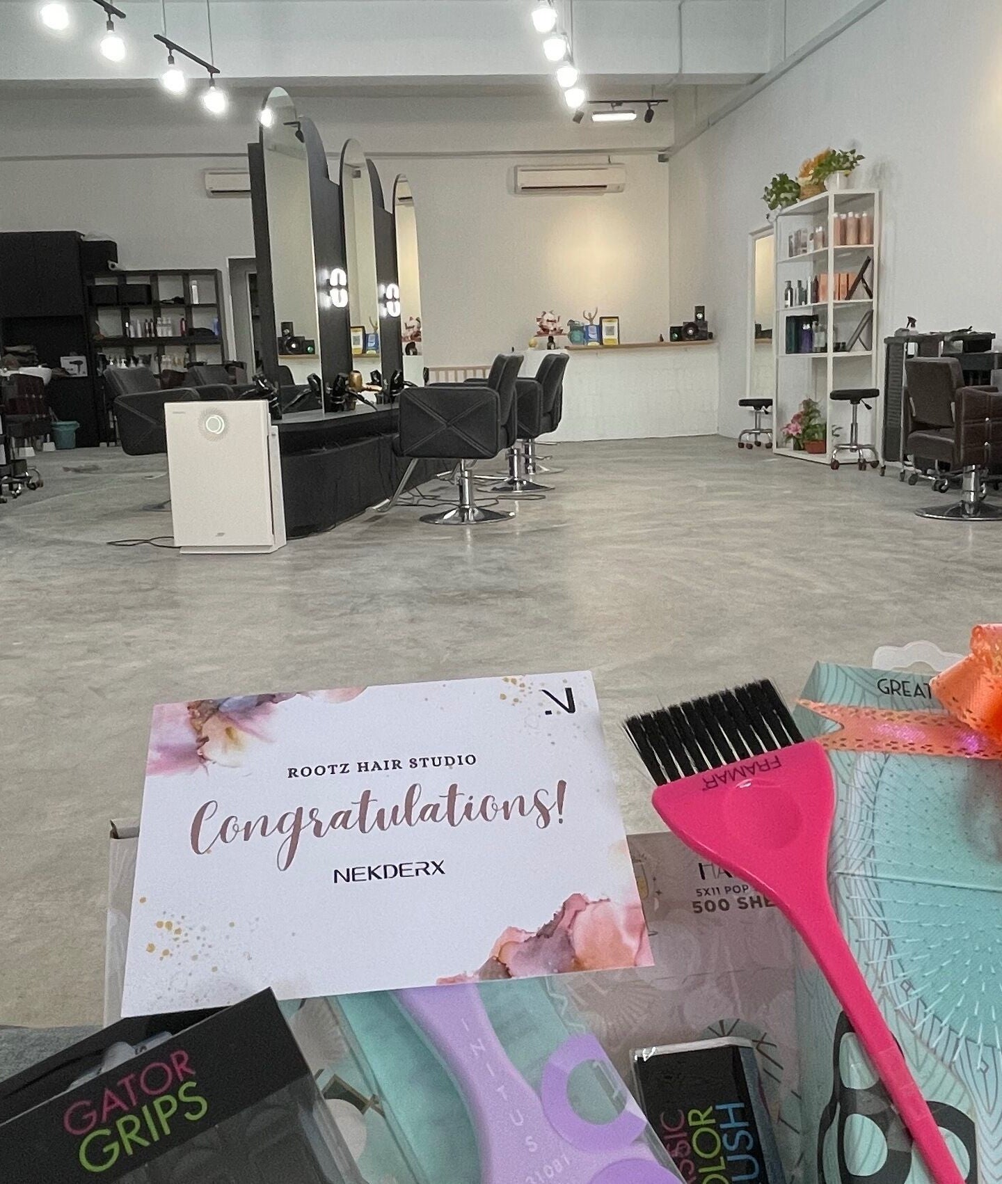 Modern interior of Rootz Hair Studio in Petaling Jaya, Selangor, MY featuring stylish chairs and decor.